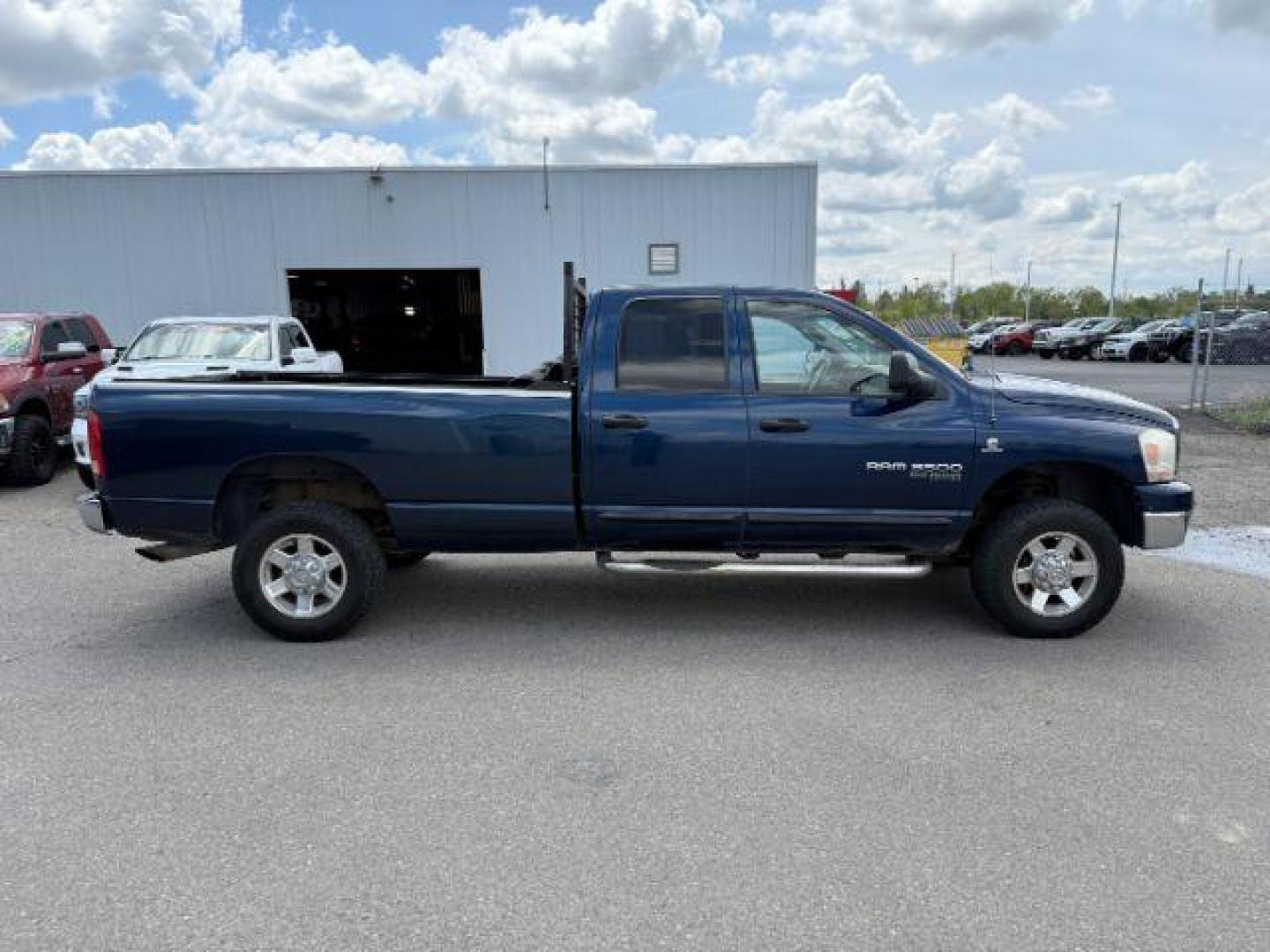 2006 BLUE /Medium Slate Gray Cloth Interior Dodge Ram 3500 SLT Quad Cab Long Bed 4WD (3D7LX38C96G) with an 5.9L L6 OHV 24V TURBO DIESEL engine, 6-Speed Manual transmission, located at 1235 N Woodruff Ave., Idaho Falls, 83401, (208) 523-1053, 43.507172, -112.000488 - At Timberline Auto, finding a great deal on your next vehicle is always easy! Our experienced sales staff's goal is to help find you the right vehicle at the right price! Our knowledgeable finance department has options for almost any credit score. We offer extended service contract options to prote - Photo#6