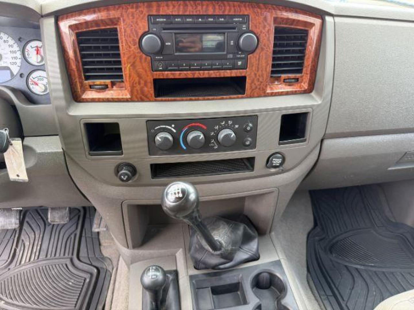 2006 BLUE /Medium Slate Gray Cloth Interior Dodge Ram 3500 SLT Quad Cab Long Bed 4WD (3D7LX38C96G) with an 5.9L L6 OHV 24V TURBO DIESEL engine, 6-Speed Manual transmission, located at 1235 N Woodruff Ave., Idaho Falls, 83401, (208) 523-1053, 43.507172, -112.000488 - At Timberline Auto, finding a great deal on your next vehicle is always easy! Our experienced sales staff's goal is to help find you the right vehicle at the right price! Our knowledgeable finance department has options for almost any credit score. We offer extended service contract options to prote - Photo#12