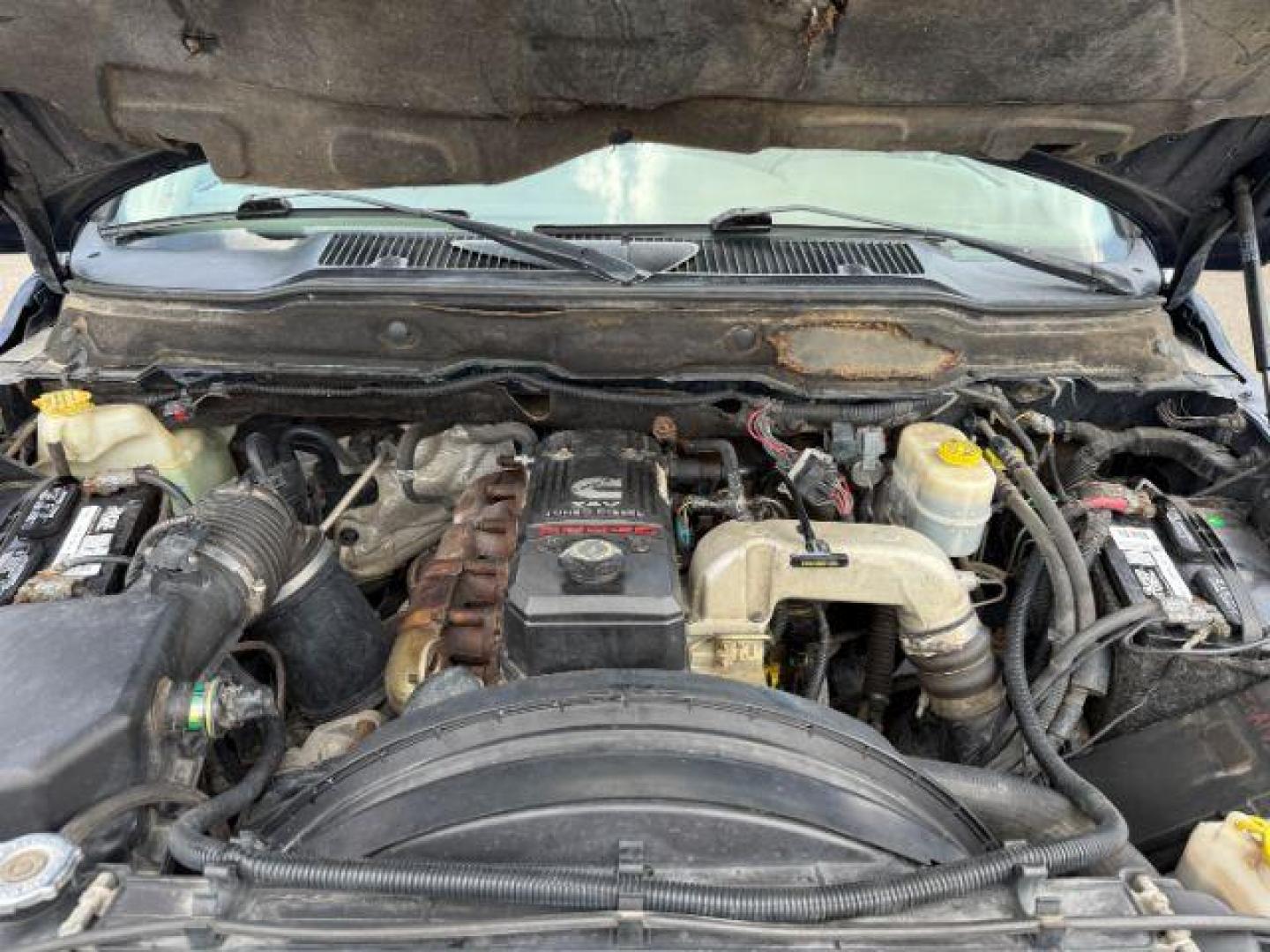 2006 BLUE /Medium Slate Gray Cloth Interior Dodge Ram 3500 SLT Quad Cab Long Bed 4WD (3D7LX38C96G) with an 5.9L L6 OHV 24V TURBO DIESEL engine, 6-Speed Manual transmission, located at 1235 N Woodruff Ave., Idaho Falls, 83401, (208) 523-1053, 43.507172, -112.000488 - At Timberline Auto, finding a great deal on your next vehicle is always easy! Our experienced sales staff's goal is to help find you the right vehicle at the right price! Our knowledgeable finance department has options for almost any credit score. We offer extended service contract options to prote - Photo#17