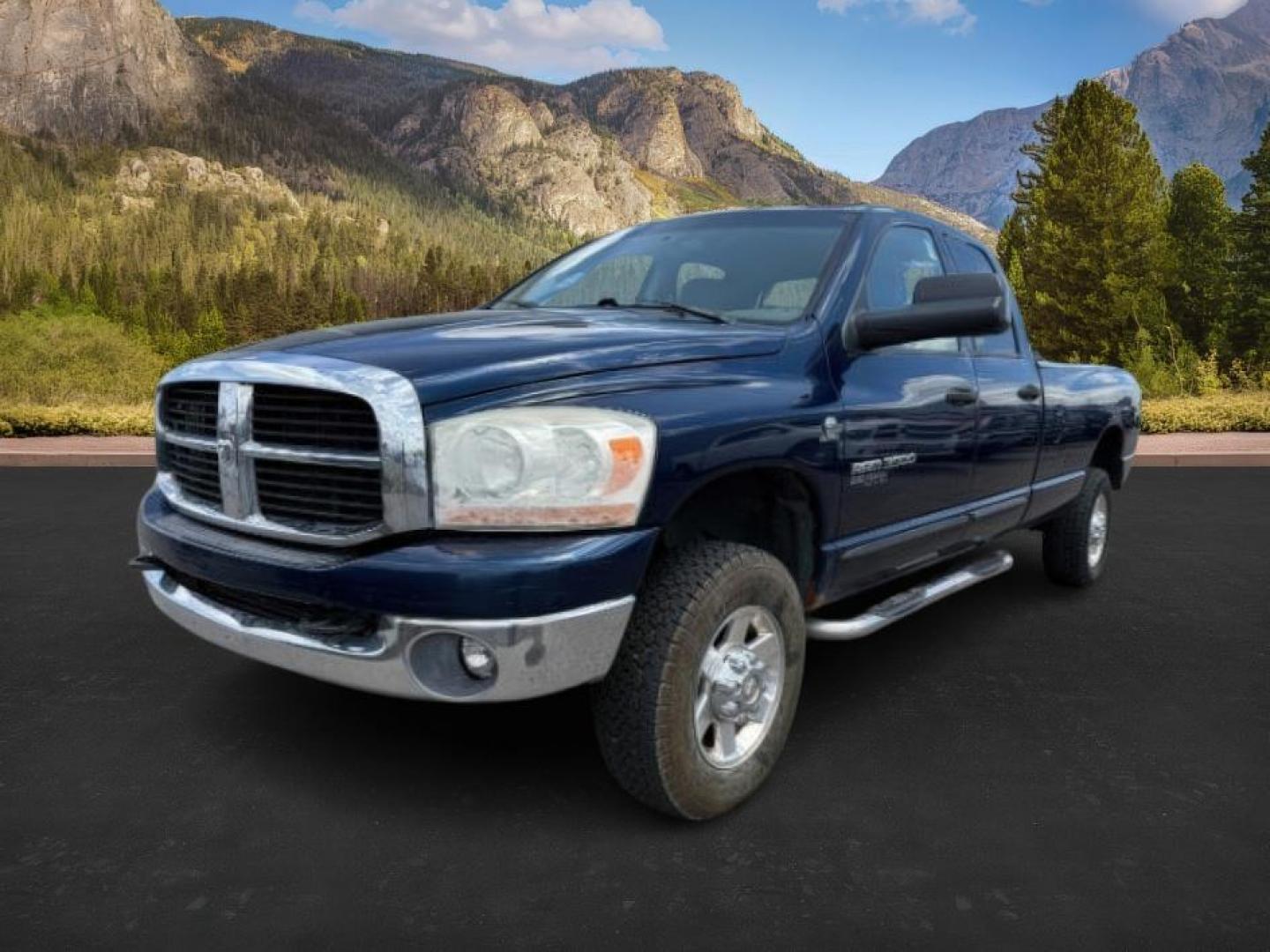 2006 BLUE /Medium Slate Gray Cloth Interior Dodge Ram 3500 SLT Quad Cab Long Bed 4WD (3D7LX38C96G) with an 5.9L L6 OHV 24V TURBO DIESEL engine, 6-Speed Manual transmission, located at 1235 N Woodruff Ave., Idaho Falls, 83401, (208) 523-1053, 43.507172, -112.000488 - At Timberline Auto, finding a great deal on your next vehicle is always easy! Our experienced sales staff's goal is to help find you the right vehicle at the right price! Our knowledgeable finance department has options for almost any credit score. We offer extended service contract options to prote - Photo#0
