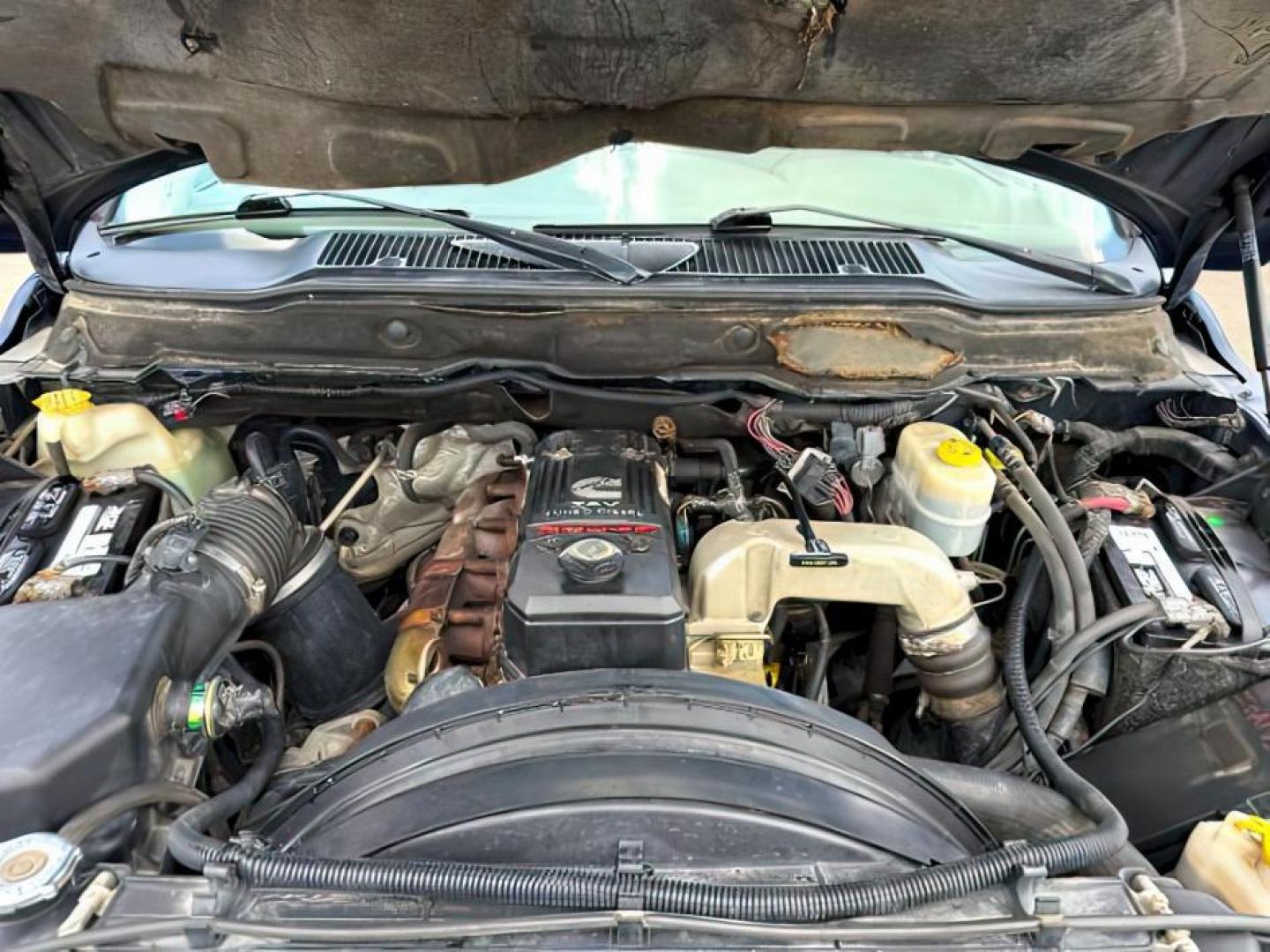 2006 BLUE /Medium Slate Gray Cloth Interior Dodge Ram 3500 SLT Quad Cab Long Bed 4WD (3D7LX38C96G) with an 5.9L L6 OHV 24V TURBO DIESEL engine, 6-Speed Manual transmission, located at 1235 N Woodruff Ave., Idaho Falls, 83401, (208) 523-1053, 43.507172, -112.000488 - At Timberline Auto, finding a great deal on your next vehicle is always easy! Our experienced sales staff's goal is to help find you the right vehicle at the right price! Our knowledgeable finance department has options for almost any credit score. We offer extended service contract options to prote - Photo#17