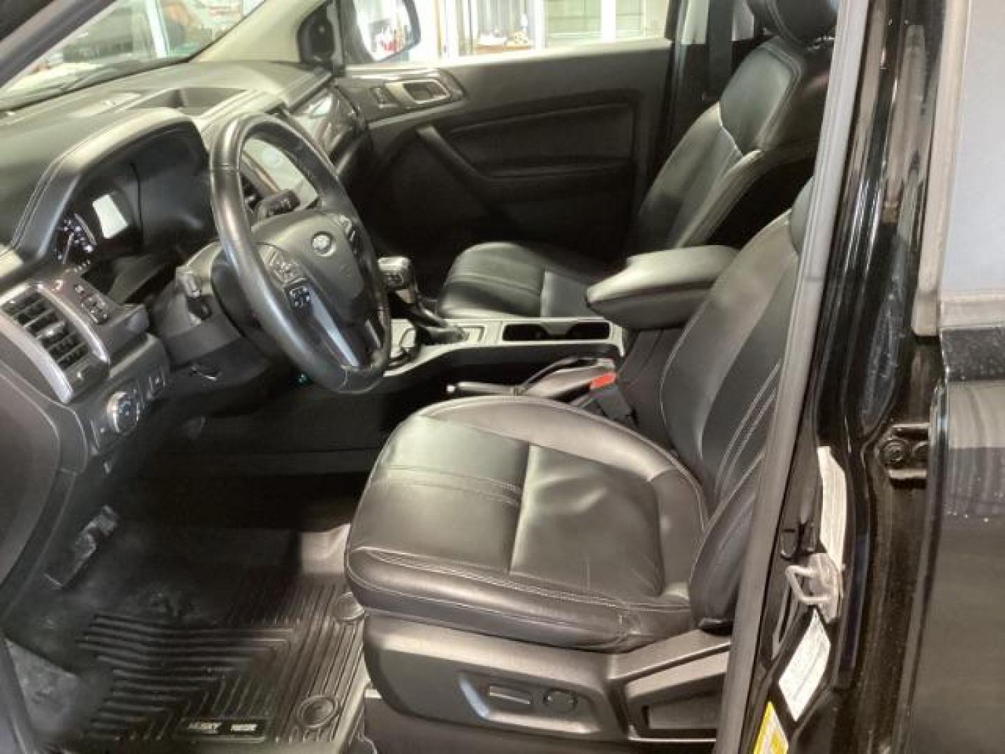2019 Shadow Black /Ebony, leather Ford Ranger Lariat SuperCrew 4WD (1FTER4FHXKL) with an 2.3L L4 DOHC 16V engine, 10-Speed Automatic transmission, located at 1235 N Woodruff Ave., Idaho Falls, 83401, (208) 523-1053, 43.507172, -112.000488 - At Timberline Auto, finding a great deal on your next vehicle is always easy! Our experienced sales staff's goal is to help find you the right vehicle at the right price! Our knowledgeable finance department has options for almost any credit score. We offer extended service contract options to prote - Photo#10