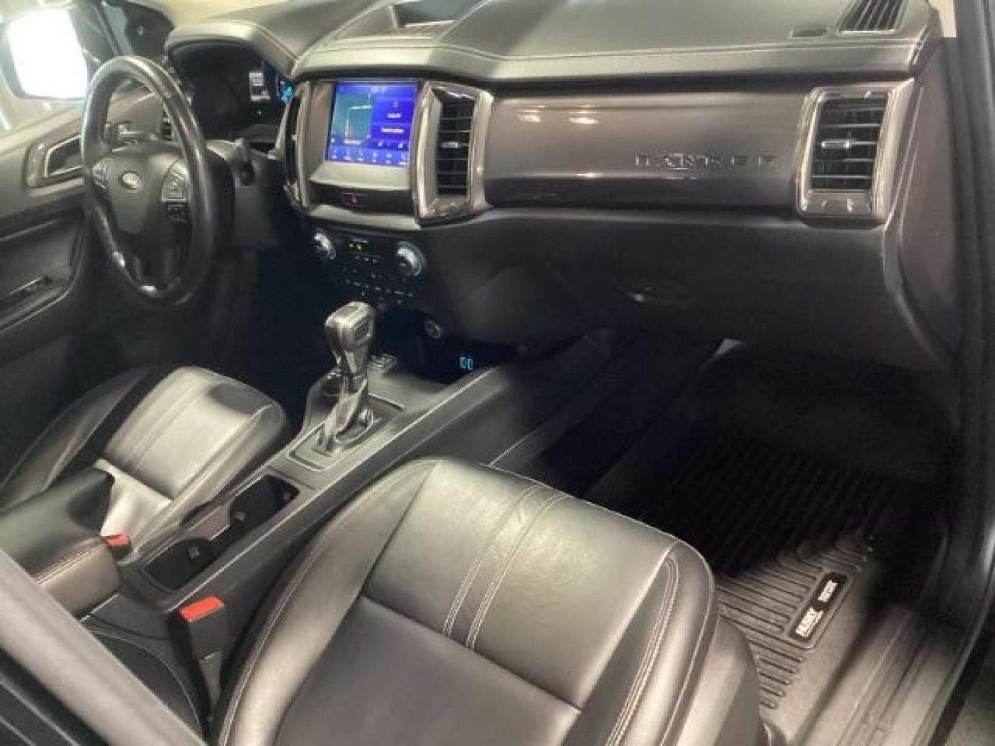 2019 Shadow Black /Ebony, leather Ford Ranger Lariat SuperCrew 4WD (1FTER4FHXKL) with an 2.3L L4 DOHC 16V engine, 10-Speed Automatic transmission, located at 1235 N Woodruff Ave., Idaho Falls, 83401, (208) 523-1053, 43.507172, -112.000488 - At Timberline Auto, finding a great deal on your next vehicle is always easy! Our experienced sales staff's goal is to help find you the right vehicle at the right price! Our knowledgeable finance department has options for almost any credit score. We offer extended service contract options to prote - Photo#14