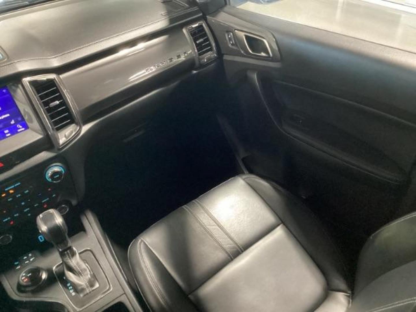 2019 Shadow Black /Ebony, leather Ford Ranger Lariat SuperCrew 4WD (1FTER4FHXKL) with an 2.3L L4 DOHC 16V engine, 10-Speed Automatic transmission, located at 1235 N Woodruff Ave., Idaho Falls, 83401, (208) 523-1053, 43.507172, -112.000488 - At Timberline Auto, finding a great deal on your next vehicle is always easy! Our experienced sales staff's goal is to help find you the right vehicle at the right price! Our knowledgeable finance department has options for almost any credit score. We offer extended service contract options to prote - Photo#18