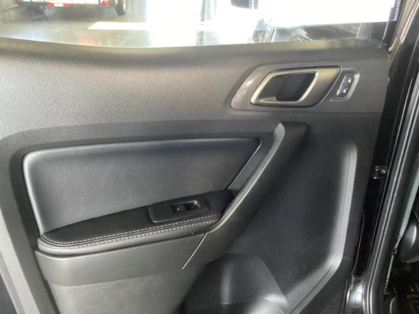 2019 Shadow Black /Ebony, leather Ford Ranger Lariat SuperCrew 4WD (1FTER4FHXKL) with an 2.3L L4 DOHC 16V engine, 10-Speed Automatic transmission, located at 1235 N Woodruff Ave., Idaho Falls, 83401, (208) 523-1053, 43.507172, -112.000488 - At Timberline Auto, finding a great deal on your next vehicle is always easy! Our experienced sales staff's goal is to help find you the right vehicle at the right price! Our knowledgeable finance department has options for almost any credit score. We offer extended service contract options to prote - Photo#25