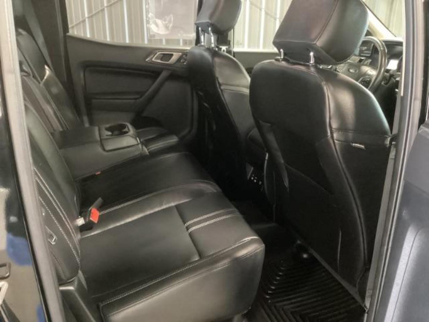 2019 Shadow Black /Ebony, leather Ford Ranger Lariat SuperCrew 4WD (1FTER4FHXKL) with an 2.3L L4 DOHC 16V engine, 10-Speed Automatic transmission, located at 1235 N Woodruff Ave., Idaho Falls, 83401, (208) 523-1053, 43.507172, -112.000488 - At Timberline Auto, finding a great deal on your next vehicle is always easy! Our experienced sales staff's goal is to help find you the right vehicle at the right price! Our knowledgeable finance department has options for almost any credit score. We offer extended service contract options to prote - Photo#26