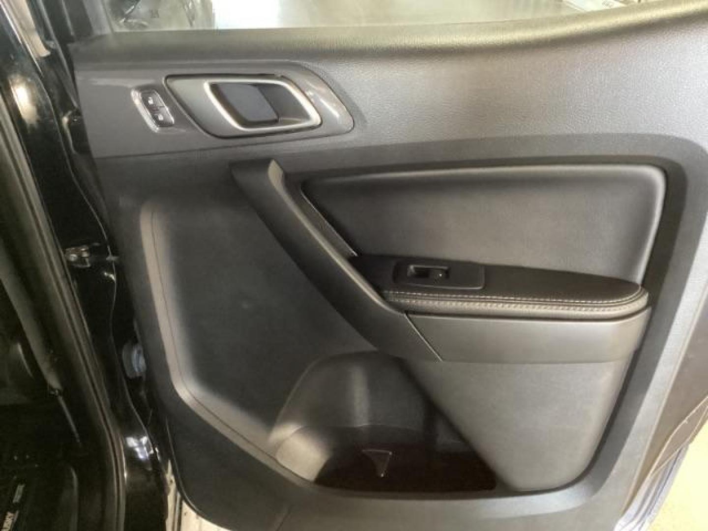 2019 Shadow Black /Ebony, leather Ford Ranger Lariat SuperCrew 4WD (1FTER4FHXKL) with an 2.3L L4 DOHC 16V engine, 10-Speed Automatic transmission, located at 1235 N Woodruff Ave., Idaho Falls, 83401, (208) 523-1053, 43.507172, -112.000488 - At Timberline Auto, finding a great deal on your next vehicle is always easy! Our experienced sales staff's goal is to help find you the right vehicle at the right price! Our knowledgeable finance department has options for almost any credit score. We offer extended service contract options to prote - Photo#27