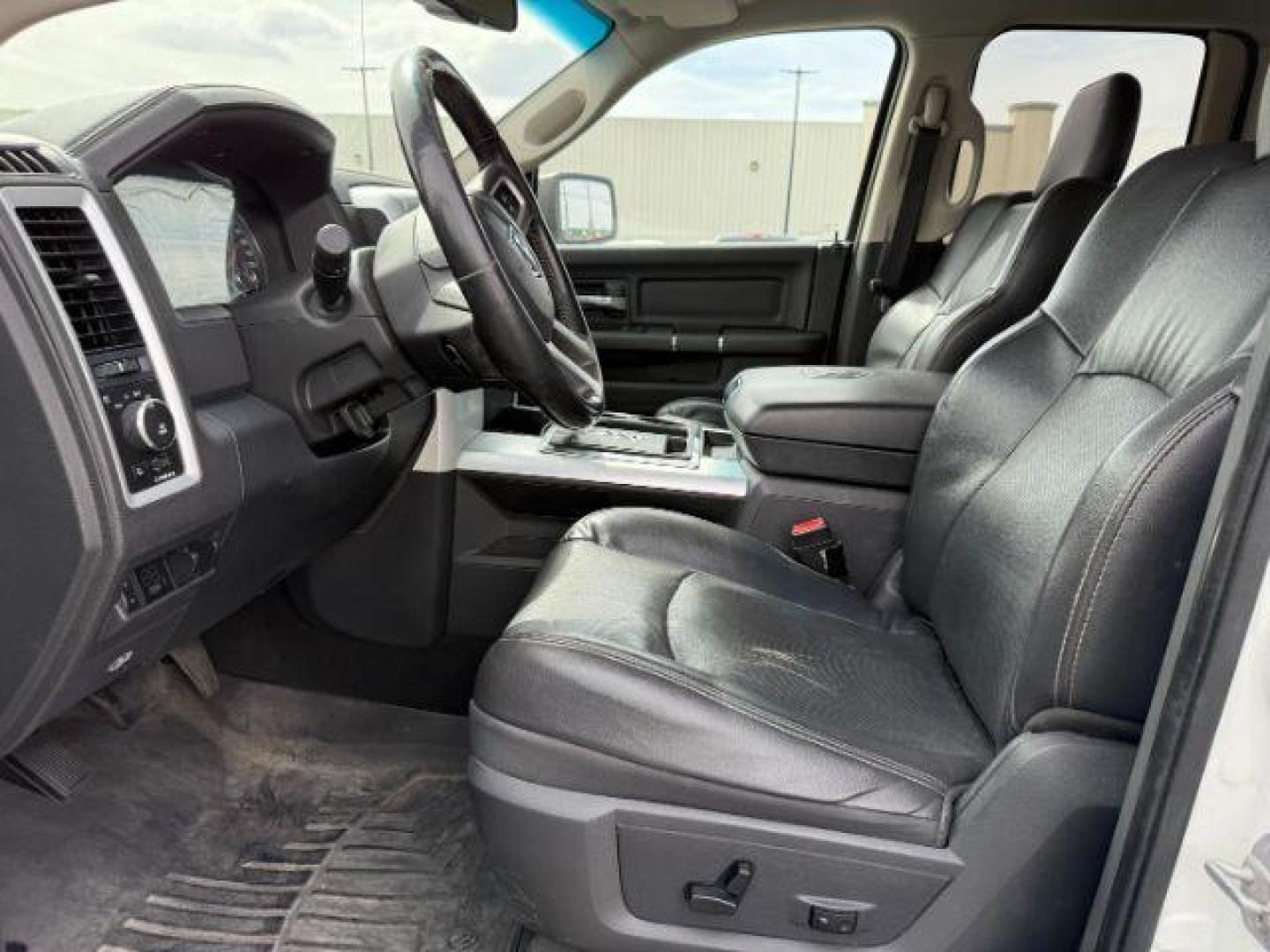 2011 Bright White /Dark Slate Leather Interior RAM 1500 Laramie Quad Cab 4WD (1D7RV1GT9BS) with an 5.7L V8 OHV 16V engine, 5-Speed Automatic transmission, located at 1235 N Woodruff Ave., Idaho Falls, 83401, (208) 523-1053, 43.507172, -112.000488 - At Timberline Auto, finding a great deal on your next vehicle is always easy! Our experienced sales staff's goal is to help find you the right vehicle at the right price! Our knowledgeable finance department has options for almost any credit score. We offer extended service contract options to prote - Photo#11