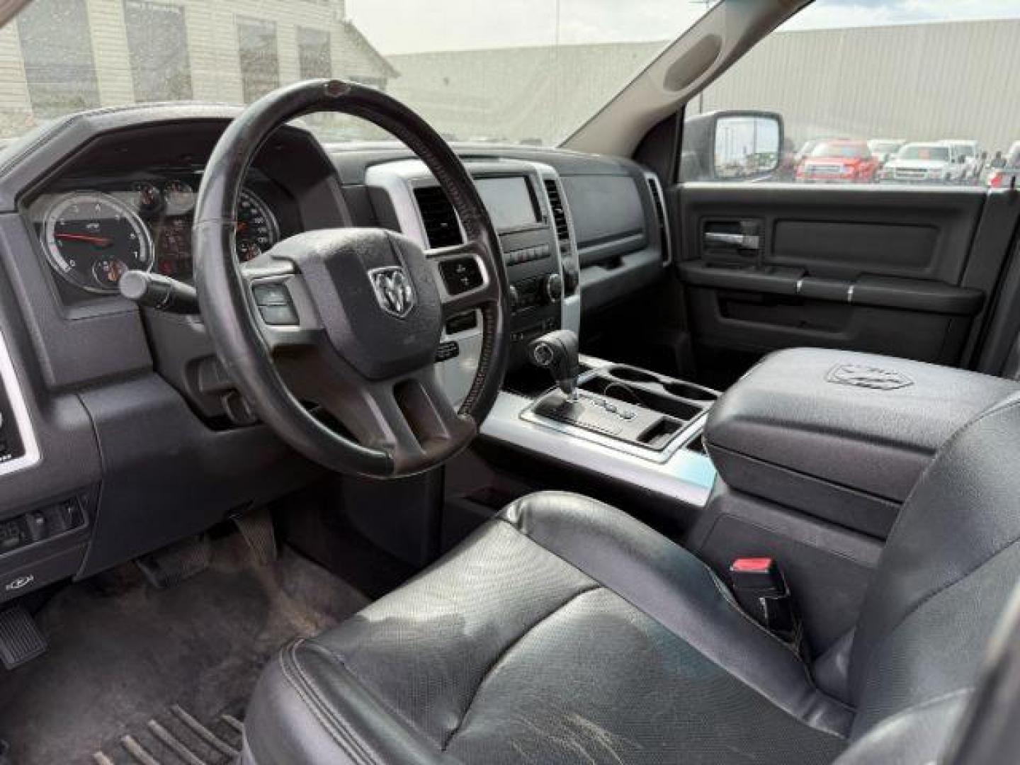 2011 Bright White /Dark Slate Leather Interior RAM 1500 Laramie Quad Cab 4WD (1D7RV1GT9BS) with an 5.7L V8 OHV 16V engine, 5-Speed Automatic transmission, located at 1235 N Woodruff Ave., Idaho Falls, 83401, (208) 523-1053, 43.507172, -112.000488 - At Timberline Auto, finding a great deal on your next vehicle is always easy! Our experienced sales staff's goal is to help find you the right vehicle at the right price! Our knowledgeable finance department has options for almost any credit score. We offer extended service contract options to prote - Photo#12