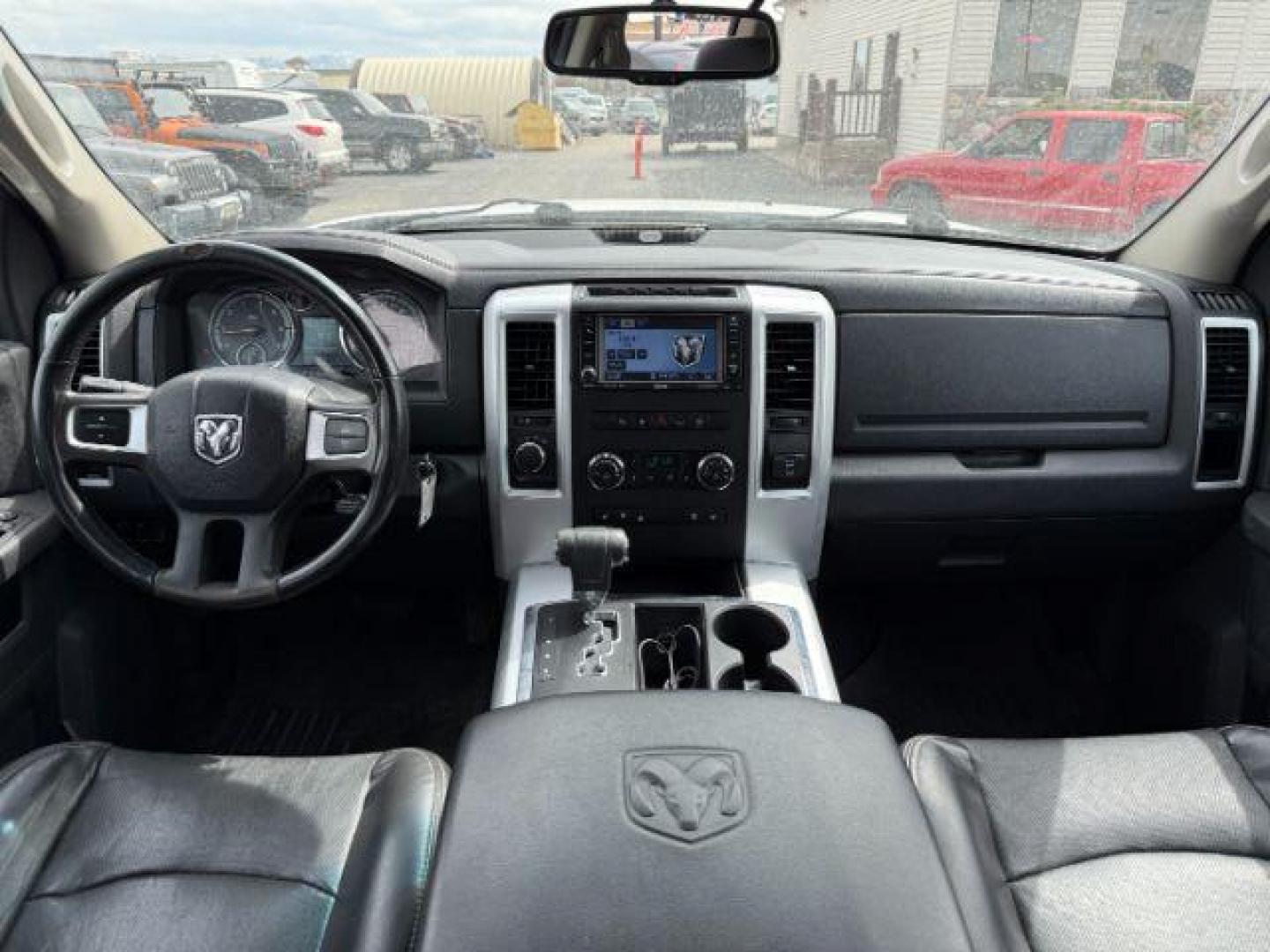 2011 Bright White /Dark Slate Leather Interior RAM 1500 Laramie Quad Cab 4WD (1D7RV1GT9BS) with an 5.7L V8 OHV 16V engine, 5-Speed Automatic transmission, located at 1235 N Woodruff Ave., Idaho Falls, 83401, (208) 523-1053, 43.507172, -112.000488 - At Timberline Auto, finding a great deal on your next vehicle is always easy! Our experienced sales staff's goal is to help find you the right vehicle at the right price! Our knowledgeable finance department has options for almost any credit score. We offer extended service contract options to prote - Photo#19