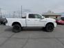 2011 Bright White /Dark Slate Leather Interior RAM 1500 Laramie Quad Cab 4WD (1D7RV1GT9BS) with an 5.7L V8 OHV 16V engine, 5-Speed Automatic transmission, located at 1235 N Woodruff Ave., Idaho Falls, 83401, (208) 523-1053, 43.507172, -112.000488 - At Timberline Auto, finding a great deal on your next vehicle is always easy! Our experienced sales staff's goal is to help find you the right vehicle at the right price! Our knowledgeable finance department has options for almost any credit score. We offer extended service contract options to prote - Photo#7