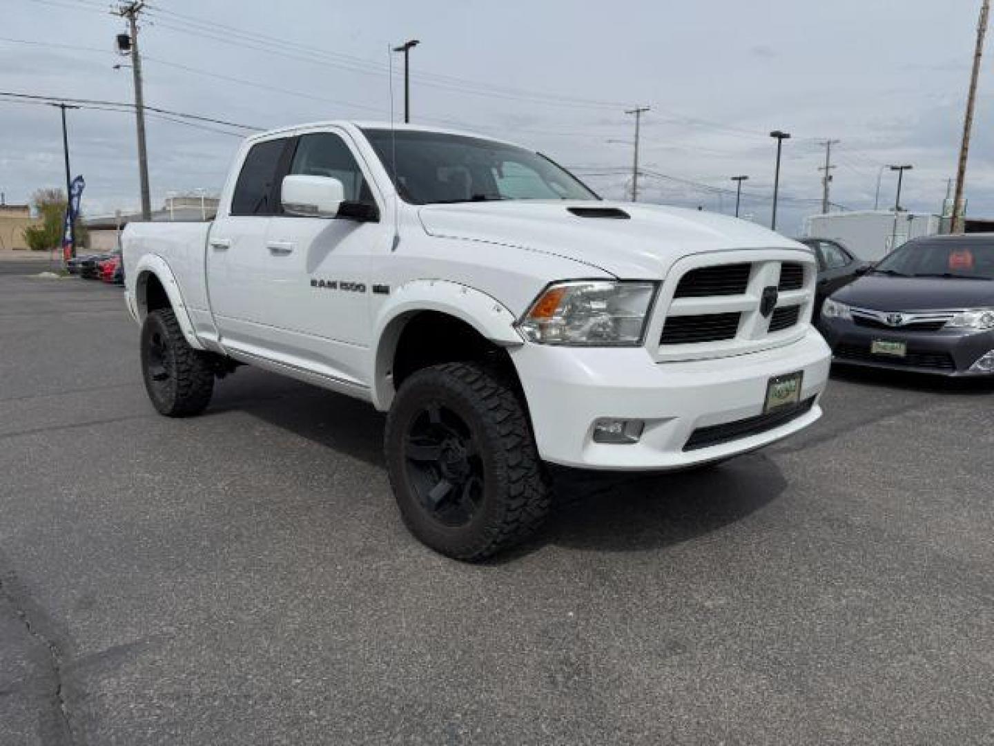 2011 Bright White /Dark Slate Leather Interior RAM 1500 Laramie Quad Cab 4WD (1D7RV1GT9BS) with an 5.7L V8 OHV 16V engine, 5-Speed Automatic transmission, located at 1235 N Woodruff Ave., Idaho Falls, 83401, (208) 523-1053, 43.507172, -112.000488 - At Timberline Auto, finding a great deal on your next vehicle is always easy! Our experienced sales staff's goal is to help find you the right vehicle at the right price! Our knowledgeable finance department has options for almost any credit score. We offer extended service contract options to prote - Photo#8