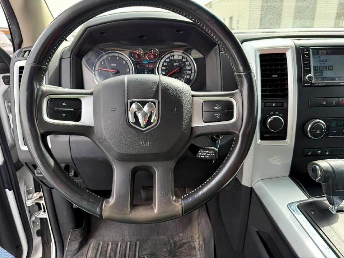 2011 Bright White /Dark Slate Leather Interior RAM 1500 Laramie Quad Cab 4WD (1D7RV1GT9BS) with an 5.7L V8 OHV 16V engine, 5-Speed Automatic transmission, located at 1235 N Woodruff Ave., Idaho Falls, 83401, (208) 523-1053, 43.507172, -112.000488 - At Timberline Auto, finding a great deal on your next vehicle is always easy! Our experienced sales staff's goal is to help find you the right vehicle at the right price! Our knowledgeable finance department has options for almost any credit score. We offer extended service contract options to prote - Photo#13