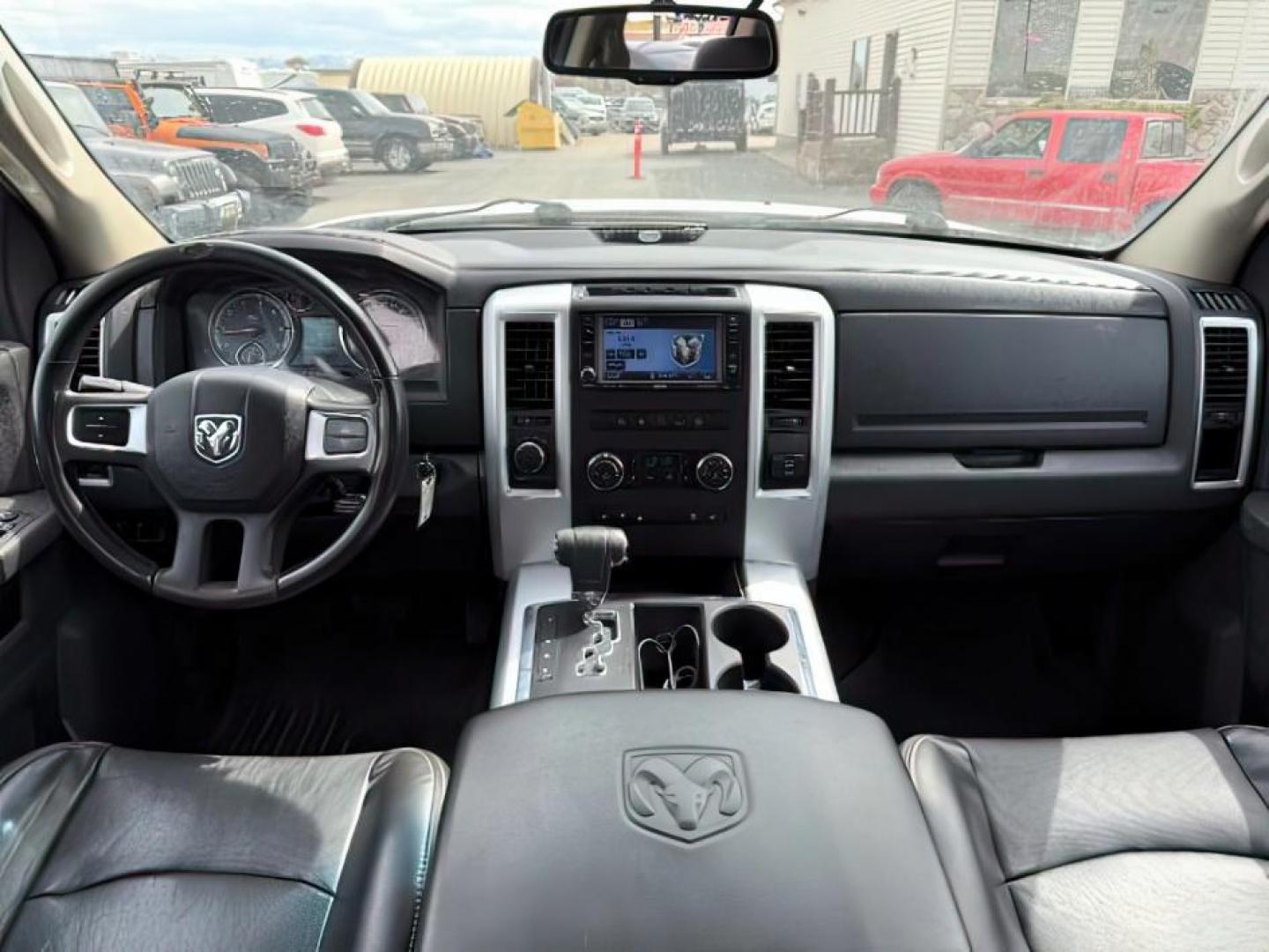 2011 Bright White /Dark Slate Leather Interior RAM 1500 Laramie Quad Cab 4WD (1D7RV1GT9BS) with an 5.7L V8 OHV 16V engine, 5-Speed Automatic transmission, located at 1235 N Woodruff Ave., Idaho Falls, 83401, (208) 523-1053, 43.507172, -112.000488 - At Timberline Auto, finding a great deal on your next vehicle is always easy! Our experienced sales staff's goal is to help find you the right vehicle at the right price! Our knowledgeable finance department has options for almost any credit score. We offer extended service contract options to prote - Photo#19
