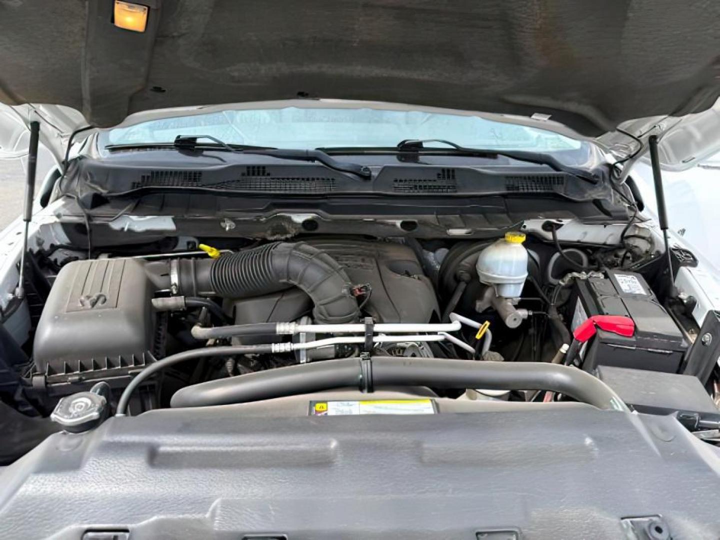 2011 Bright White /Dark Slate Leather Interior RAM 1500 Laramie Quad Cab 4WD (1D7RV1GT9BS) with an 5.7L V8 OHV 16V engine, 5-Speed Automatic transmission, located at 1235 N Woodruff Ave., Idaho Falls, 83401, (208) 523-1053, 43.507172, -112.000488 - At Timberline Auto, finding a great deal on your next vehicle is always easy! Our experienced sales staff's goal is to help find you the right vehicle at the right price! Our knowledgeable finance department has options for almost any credit score. We offer extended service contract options to prote - Photo#21