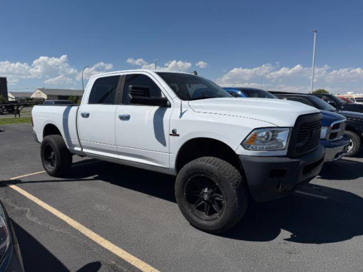 2013 Bright White Clearcoat /Black Ram 3500 (3C63R3EL8DG) with an 67L L6 OHV 24V TURBO DIESEL engine, Automatic transmission, located at 1175 N Woodruff Ave, Idaho Falls, ID, 83401, 43.506901, -111.999657 - At Timberline Auto, finding a great deal on your next vehicle is always easy! Our experienced sales staff's goal is to help find you the right vehicle at the right price! Our knowledgeable finance department has options for almost any credit score. We offer extended service contract options to prote - Photo#1
