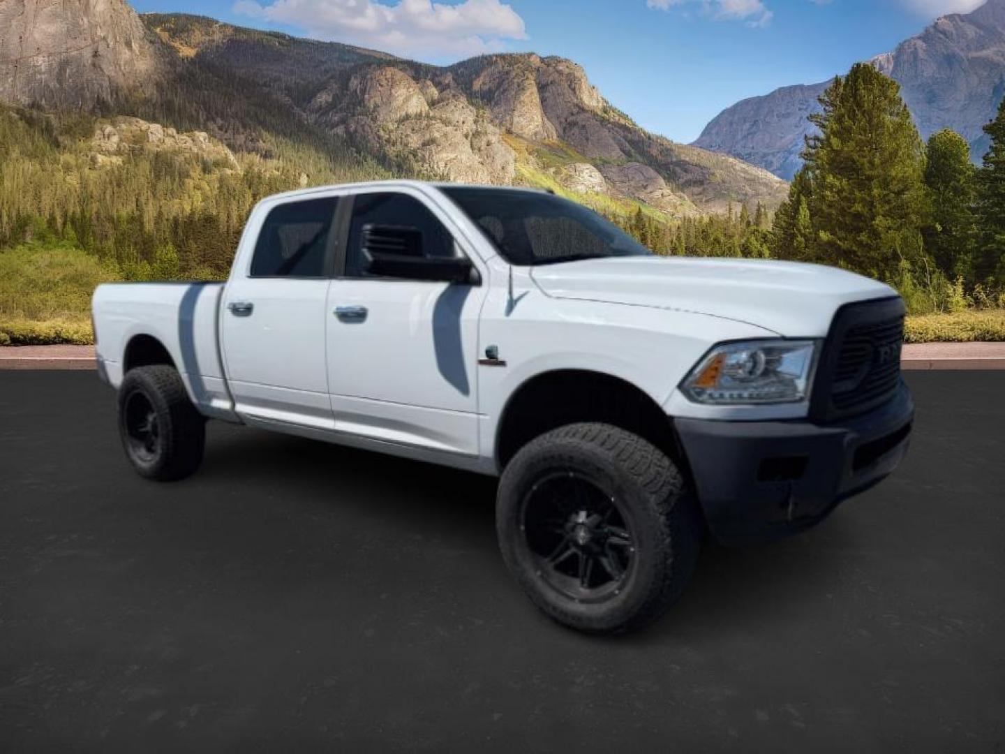 2013 Bright White Clearcoat /Black Ram 3500 (3C63R3EL8DG) with an 67L L6 OHV 24V TURBO DIESEL engine, Automatic transmission, located at 1175 N Woodruff Ave, Idaho Falls, ID, 83401, 43.506901, -111.999657 - At Timberline Auto, finding a great deal on your next vehicle is always easy! Our experienced sales staff's goal is to help find you the right vehicle at the right price! Our knowledgeable finance department has options for almost any credit score. We offer extended service contract options to prote - Photo#0