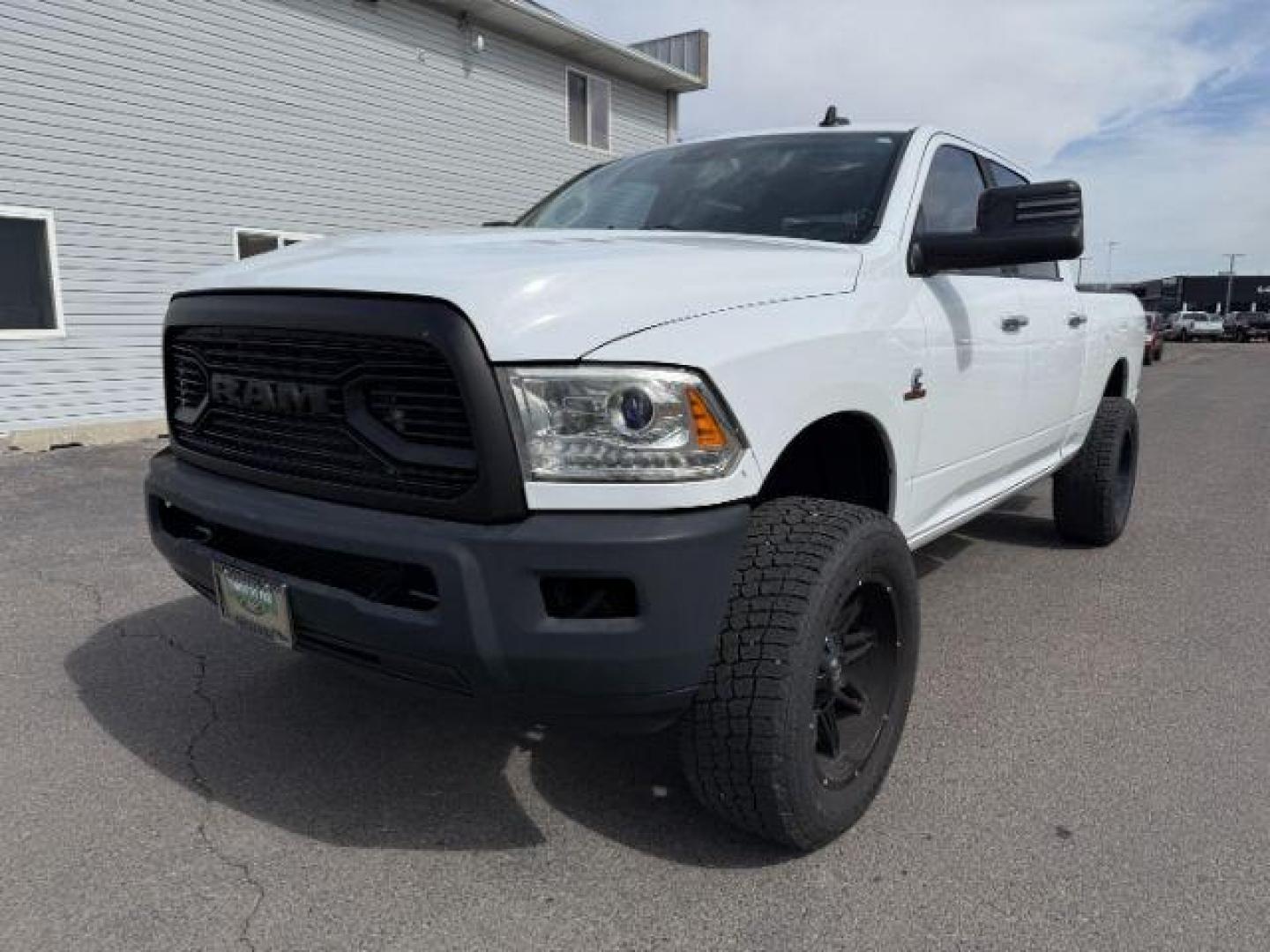 2013 Bright White Clearcoat /Black Ram 3500 (3C63R3EL8DG) with an 67L L6 OHV 24V TURBO DIESEL engine, Automatic transmission, located at 1175 N Woodruff Ave, Idaho Falls, ID, 83401, 43.506901, -111.999657 - At Timberline Auto, finding a great deal on your next vehicle is always easy! Our experienced sales staff's goal is to help find you the right vehicle at the right price! Our knowledgeable finance department has options for almost any credit score. We offer extended service contract options to prote - Photo#24