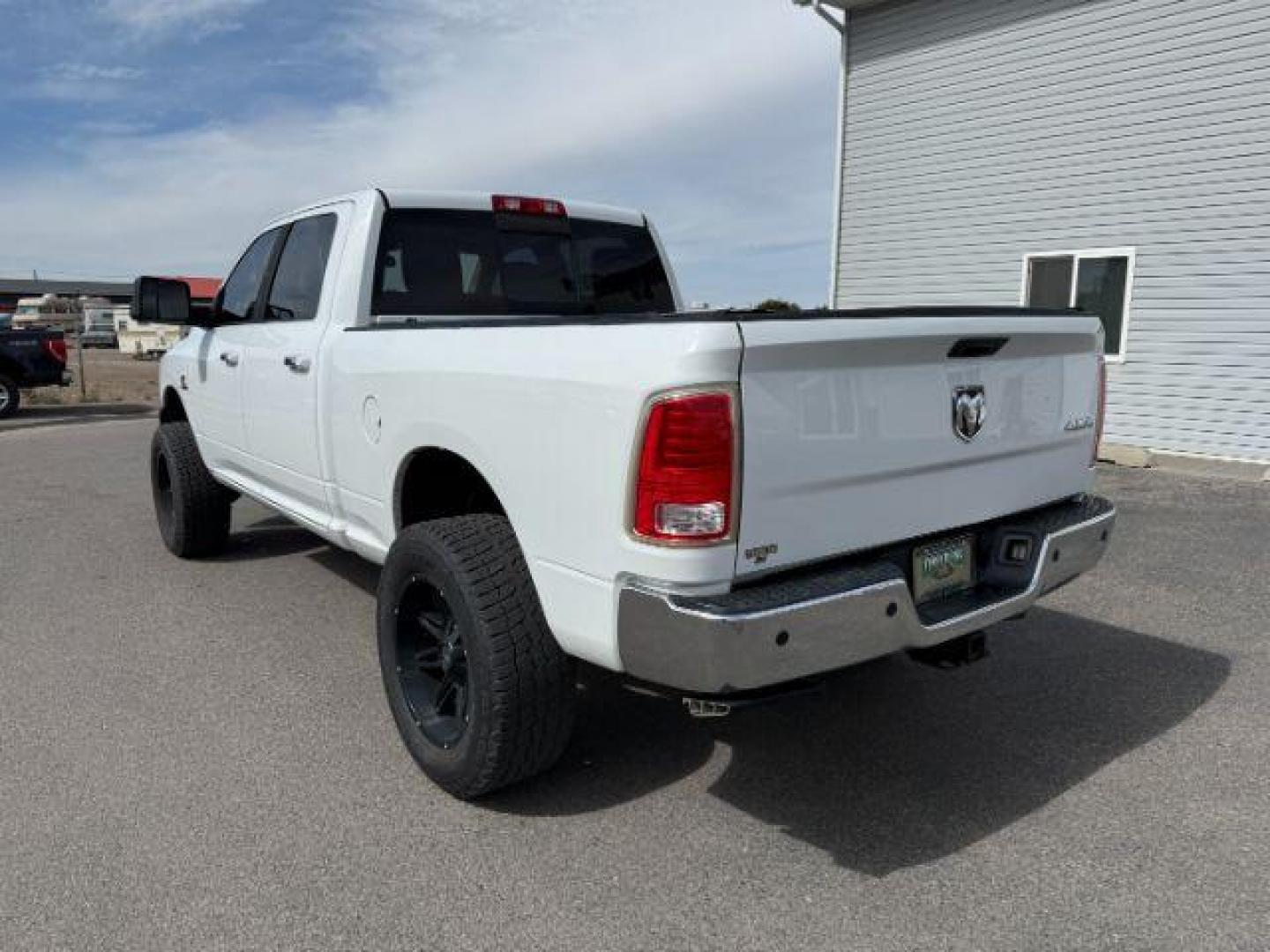 2013 Bright White Clearcoat /Black Ram 3500 (3C63R3EL8DG) with an 67L L6 OHV 24V TURBO DIESEL engine, Automatic transmission, located at 1175 N Woodruff Ave, Idaho Falls, ID, 83401, 43.506901, -111.999657 - At Timberline Auto, finding a great deal on your next vehicle is always easy! Our experienced sales staff's goal is to help find you the right vehicle at the right price! Our knowledgeable finance department has options for almost any credit score. We offer extended service contract options to prote - Photo#26