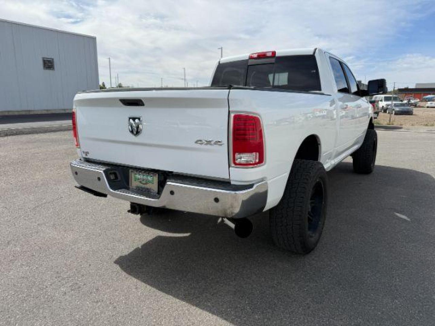 2013 Bright White Clearcoat /Black Ram 3500 (3C63R3EL8DG) with an 67L L6 OHV 24V TURBO DIESEL engine, Automatic transmission, located at 1175 N Woodruff Ave, Idaho Falls, ID, 83401, 43.506901, -111.999657 - At Timberline Auto, finding a great deal on your next vehicle is always easy! Our experienced sales staff's goal is to help find you the right vehicle at the right price! Our knowledgeable finance department has options for almost any credit score. We offer extended service contract options to prote - Photo#30