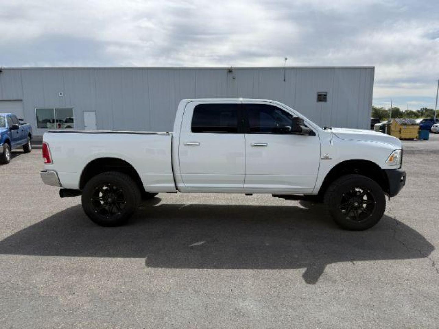 2013 Bright White Clearcoat /Black Ram 3500 (3C63R3EL8DG) with an 67L L6 OHV 24V TURBO DIESEL engine, Automatic transmission, located at 1175 N Woodruff Ave, Idaho Falls, ID, 83401, 43.506901, -111.999657 - At Timberline Auto, finding a great deal on your next vehicle is always easy! Our experienced sales staff's goal is to help find you the right vehicle at the right price! Our knowledgeable finance department has options for almost any credit score. We offer extended service contract options to prote - Photo#31