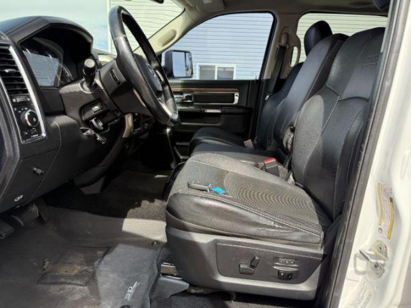 2013 Bright White Clearcoat /Black Ram 3500 (3C63R3EL8DG) with an 67L L6 OHV 24V TURBO DIESEL engine, Automatic transmission, located at 1175 N Woodruff Ave, Idaho Falls, ID, 83401, 43.506901, -111.999657 - At Timberline Auto, finding a great deal on your next vehicle is always easy! Our experienced sales staff's goal is to help find you the right vehicle at the right price! Our knowledgeable finance department has options for almost any credit score. We offer extended service contract options to prote - Photo#36