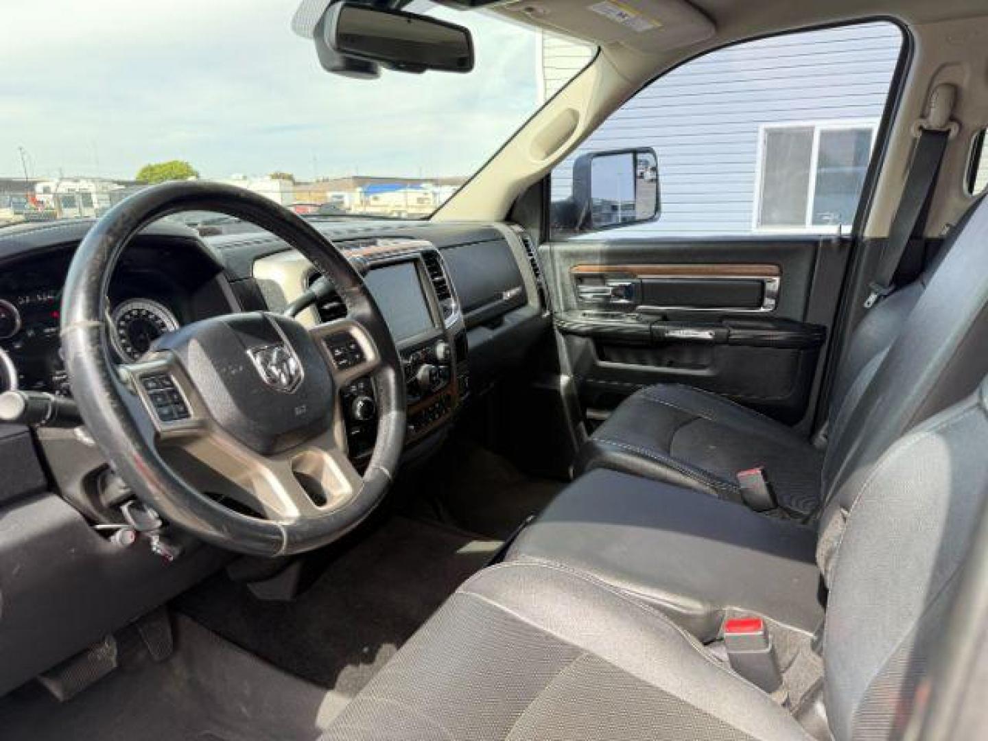 2013 Bright White Clearcoat /Black Ram 3500 (3C63R3EL8DG) with an 67L L6 OHV 24V TURBO DIESEL engine, Automatic transmission, located at 1175 N Woodruff Ave, Idaho Falls, ID, 83401, 43.506901, -111.999657 - At Timberline Auto, finding a great deal on your next vehicle is always easy! Our experienced sales staff's goal is to help find you the right vehicle at the right price! Our knowledgeable finance department has options for almost any credit score. We offer extended service contract options to prote - Photo#37