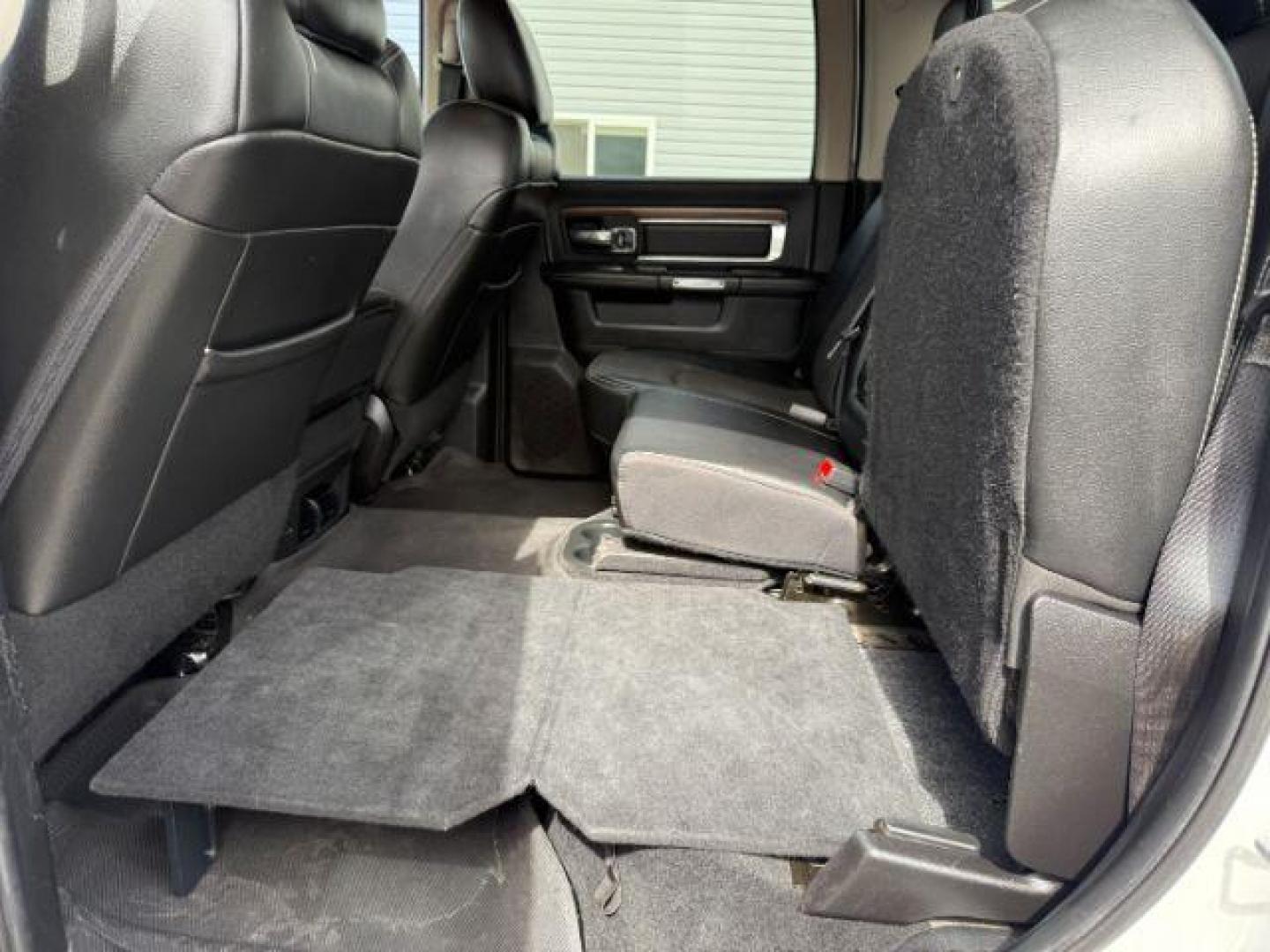 2013 Bright White Clearcoat /Black Ram 3500 (3C63R3EL8DG) with an 67L L6 OHV 24V TURBO DIESEL engine, Automatic transmission, located at 1175 N Woodruff Ave, Idaho Falls, ID, 83401, 43.506901, -111.999657 - At Timberline Auto, finding a great deal on your next vehicle is always easy! Our experienced sales staff's goal is to help find you the right vehicle at the right price! Our knowledgeable finance department has options for almost any credit score. We offer extended service contract options to prote - Photo#45