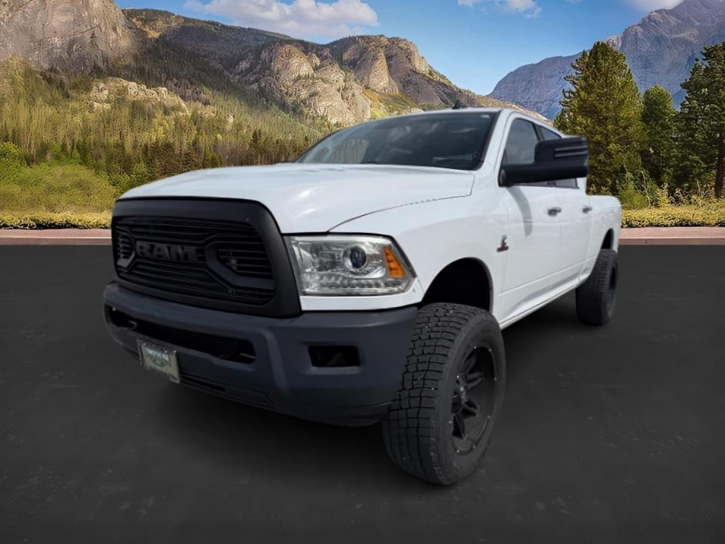 2013 Bright White Clearcoat /Black Ram 3500 (3C63R3EL8DG) with an 67L L6 OHV 24V TURBO DIESEL engine, Automatic transmission, located at 1175 N Woodruff Ave, Idaho Falls, ID, 83401, 43.506901, -111.999657 - At Timberline Auto, finding a great deal on your next vehicle is always easy! Our experienced sales staff's goal is to help find you the right vehicle at the right price! Our knowledgeable finance department has options for almost any credit score. We offer extended service contract options to prote - Photo#0