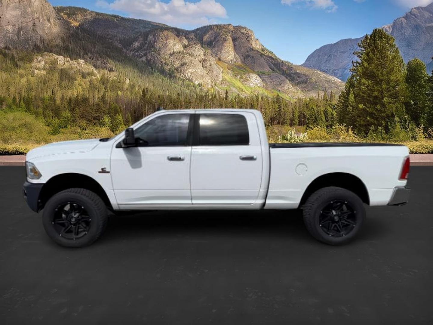 2013 Bright White Clearcoat /Black Ram 3500 (3C63R3EL8DG) with an 67L L6 OHV 24V TURBO DIESEL engine, Automatic transmission, located at 1175 N Woodruff Ave, Idaho Falls, ID, 83401, 43.506901, -111.999657 - At Timberline Auto, finding a great deal on your next vehicle is always easy! Our experienced sales staff's goal is to help find you the right vehicle at the right price! Our knowledgeable finance department has options for almost any credit score. We offer extended service contract options to prote - Photo#1