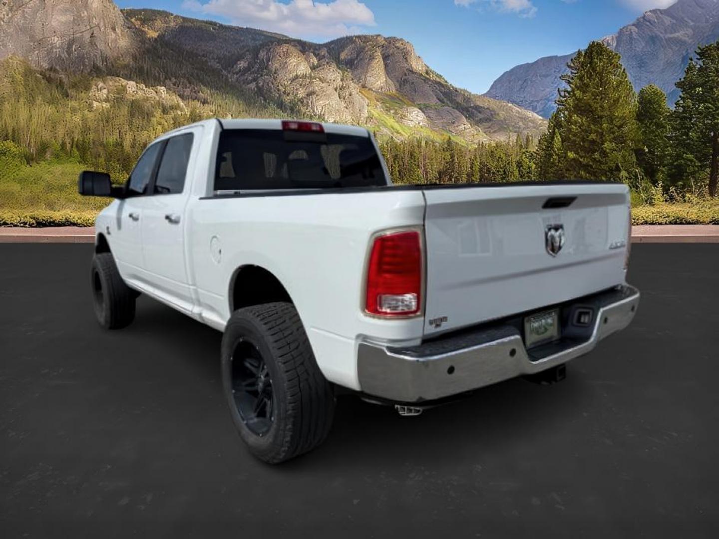 2013 Bright White Clearcoat /Black Ram 3500 (3C63R3EL8DG) with an 67L L6 OHV 24V TURBO DIESEL engine, Automatic transmission, located at 1175 N Woodruff Ave, Idaho Falls, ID, 83401, 43.506901, -111.999657 - At Timberline Auto, finding a great deal on your next vehicle is always easy! Our experienced sales staff's goal is to help find you the right vehicle at the right price! Our knowledgeable finance department has options for almost any credit score. We offer extended service contract options to prote - Photo#2