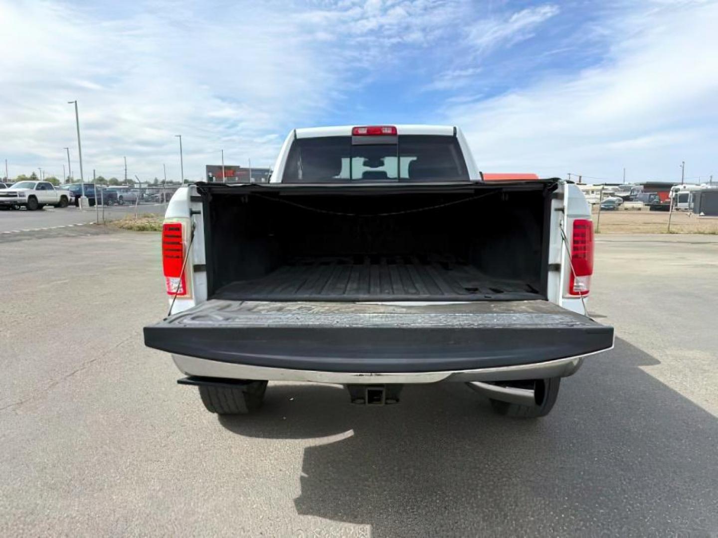 2013 Bright White Clearcoat /Black Ram 3500 (3C63R3EL8DG) with an 67L L6 OHV 24V TURBO DIESEL engine, Automatic transmission, located at 1175 N Woodruff Ave, Idaho Falls, ID, 83401, 43.506901, -111.999657 - At Timberline Auto, finding a great deal on your next vehicle is always easy! Our experienced sales staff's goal is to help find you the right vehicle at the right price! Our knowledgeable finance department has options for almost any credit score. We offer extended service contract options to prote - Photo#5