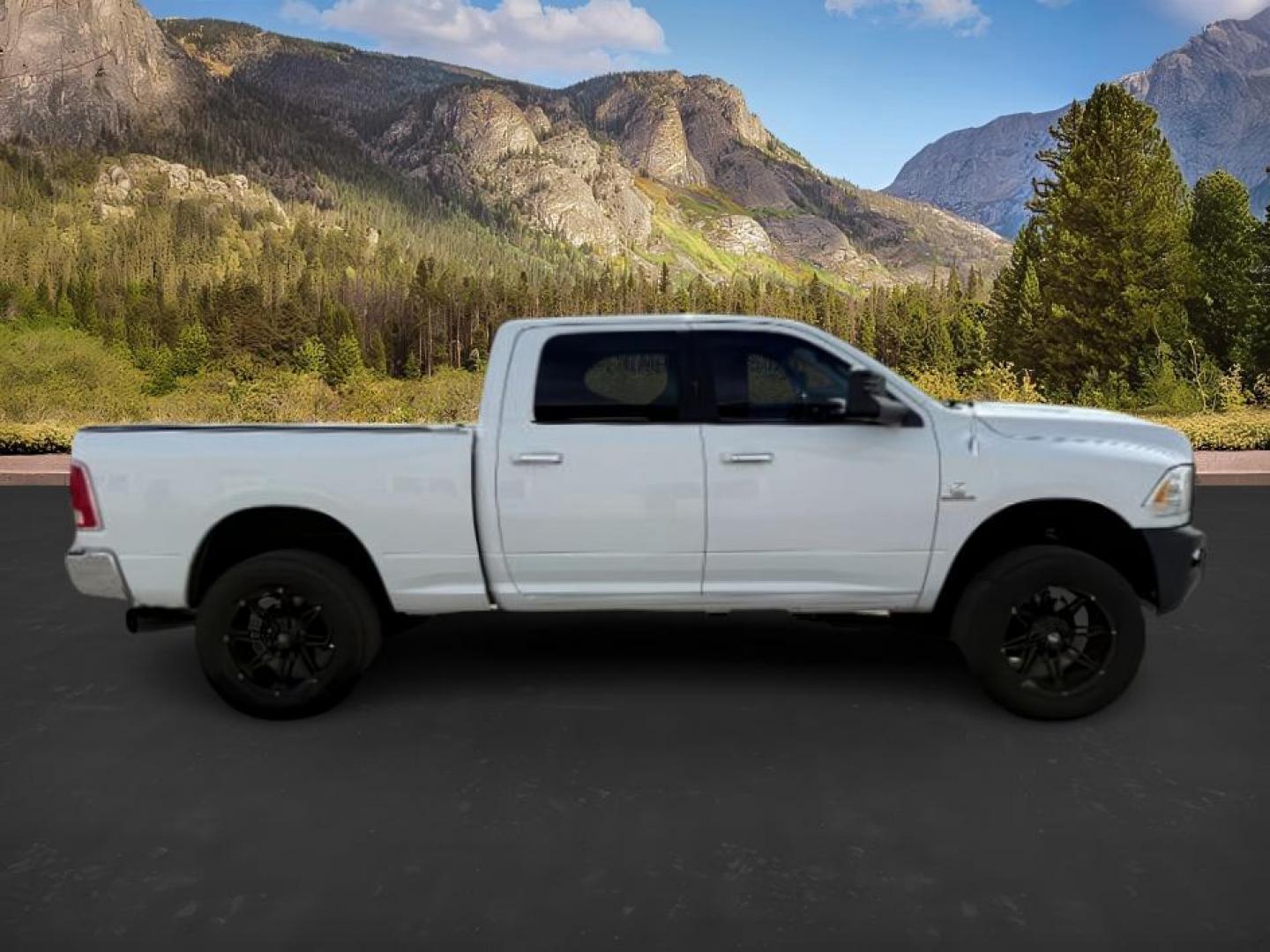 2013 Bright White Clearcoat /Black Ram 3500 (3C63R3EL8DG) with an 67L L6 OHV 24V TURBO DIESEL engine, Automatic transmission, located at 1175 N Woodruff Ave, Idaho Falls, ID, 83401, 43.506901, -111.999657 - At Timberline Auto, finding a great deal on your next vehicle is always easy! Our experienced sales staff's goal is to help find you the right vehicle at the right price! Our knowledgeable finance department has options for almost any credit score. We offer extended service contract options to prote - Photo#7