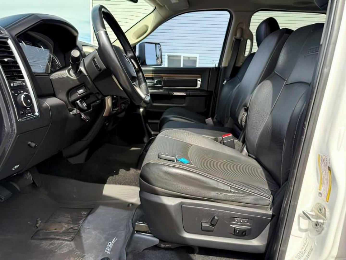 2013 Bright White Clearcoat /Black Ram 3500 (3C63R3EL8DG) with an 67L L6 OHV 24V TURBO DIESEL engine, Automatic transmission, located at 1175 N Woodruff Ave, Idaho Falls, ID, 83401, 43.506901, -111.999657 - At Timberline Auto, finding a great deal on your next vehicle is always easy! Our experienced sales staff's goal is to help find you the right vehicle at the right price! Our knowledgeable finance department has options for almost any credit score. We offer extended service contract options to prote - Photo#12