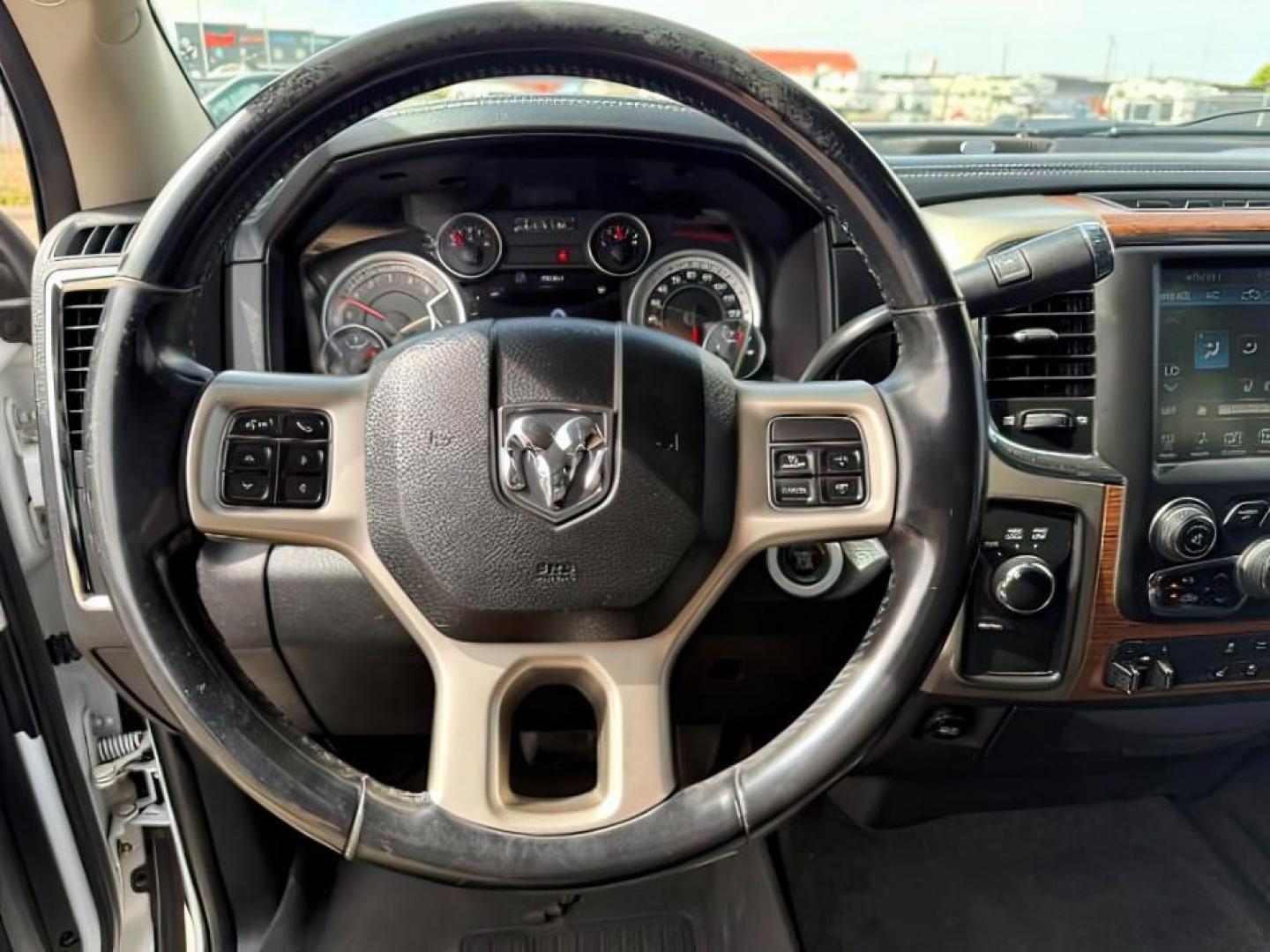 2013 Bright White Clearcoat /Black Ram 3500 (3C63R3EL8DG) with an 67L L6 OHV 24V TURBO DIESEL engine, Automatic transmission, located at 1175 N Woodruff Ave, Idaho Falls, ID, 83401, 43.506901, -111.999657 - At Timberline Auto, finding a great deal on your next vehicle is always easy! Our experienced sales staff's goal is to help find you the right vehicle at the right price! Our knowledgeable finance department has options for almost any credit score. We offer extended service contract options to prote - Photo#14