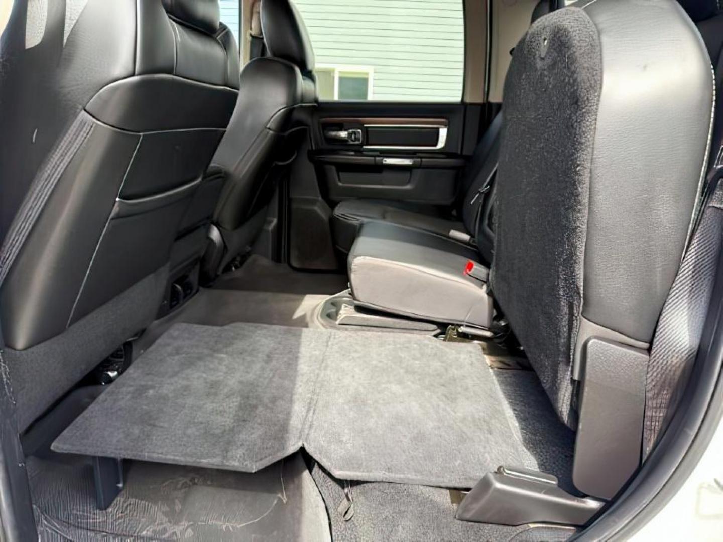 2013 Bright White Clearcoat /Black Ram 3500 (3C63R3EL8DG) with an 67L L6 OHV 24V TURBO DIESEL engine, Automatic transmission, located at 1175 N Woodruff Ave, Idaho Falls, ID, 83401, 43.506901, -111.999657 - At Timberline Auto, finding a great deal on your next vehicle is always easy! Our experienced sales staff's goal is to help find you the right vehicle at the right price! Our knowledgeable finance department has options for almost any credit score. We offer extended service contract options to prote - Photo#21