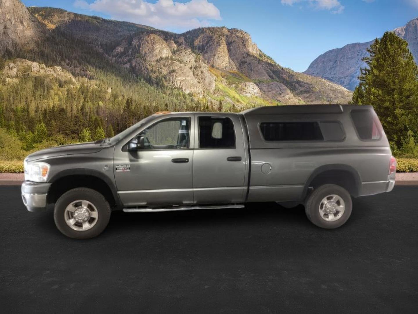 2007 GRAY /Medium Slate Gray Cloth Interior Dodge Ram 3500 SLT Quad Cab LWB 4WD DRW (3D7MX38C57G) with an 5.9L L6 OHV 24V TURBO DIESEL engine, 4-Speed Automatic transmission, located at 1235 N Woodruff Ave., Idaho Falls, 83401, (208) 523-1053, 43.507172, -112.000488 - At Timberline Auto, finding a great deal on your next vehicle is always easy! Our experienced sales staff's goal is to help find you the right vehicle at the right price! Our knowledgeable finance department has options for almost any credit score. We offer extended service contract options to prote - Photo#1