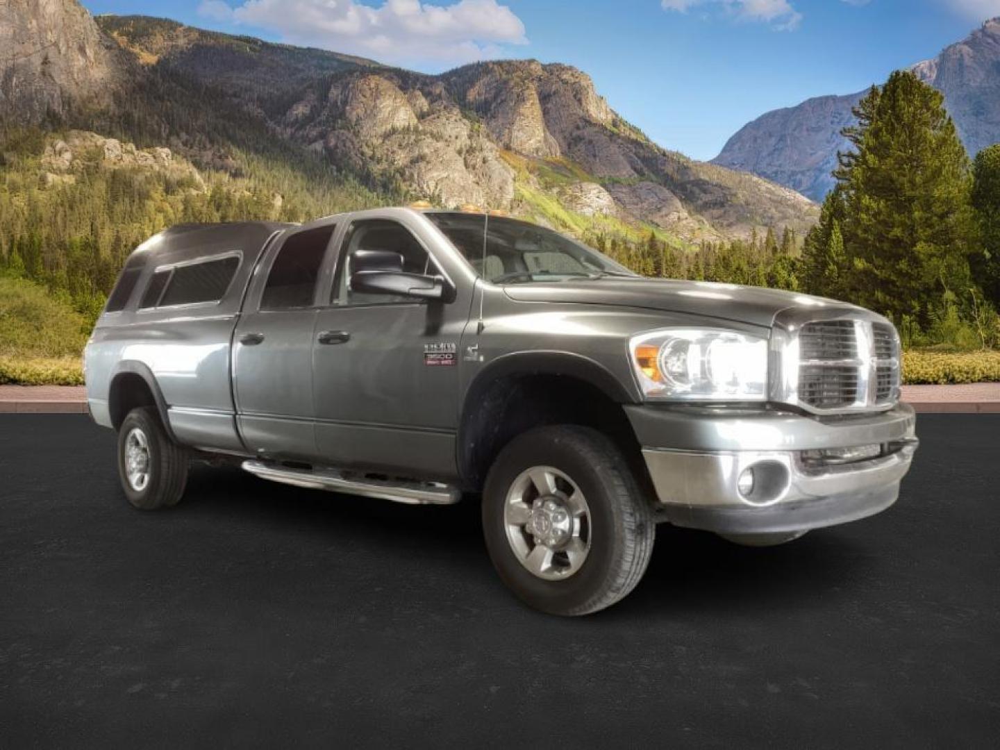 2007 GRAY /Medium Slate Gray Cloth Interior Dodge Ram 3500 SLT Quad Cab LWB 4WD DRW (3D7MX38C57G) with an 5.9L L6 OHV 24V TURBO DIESEL engine, 4-Speed Automatic transmission, located at 1235 N Woodruff Ave., Idaho Falls, 83401, (208) 523-1053, 43.507172, -112.000488 - At Timberline Auto, finding a great deal on your next vehicle is always easy! Our experienced sales staff's goal is to help find you the right vehicle at the right price! Our knowledgeable finance department has options for almost any credit score. We offer extended service contract options to prote - Photo#4