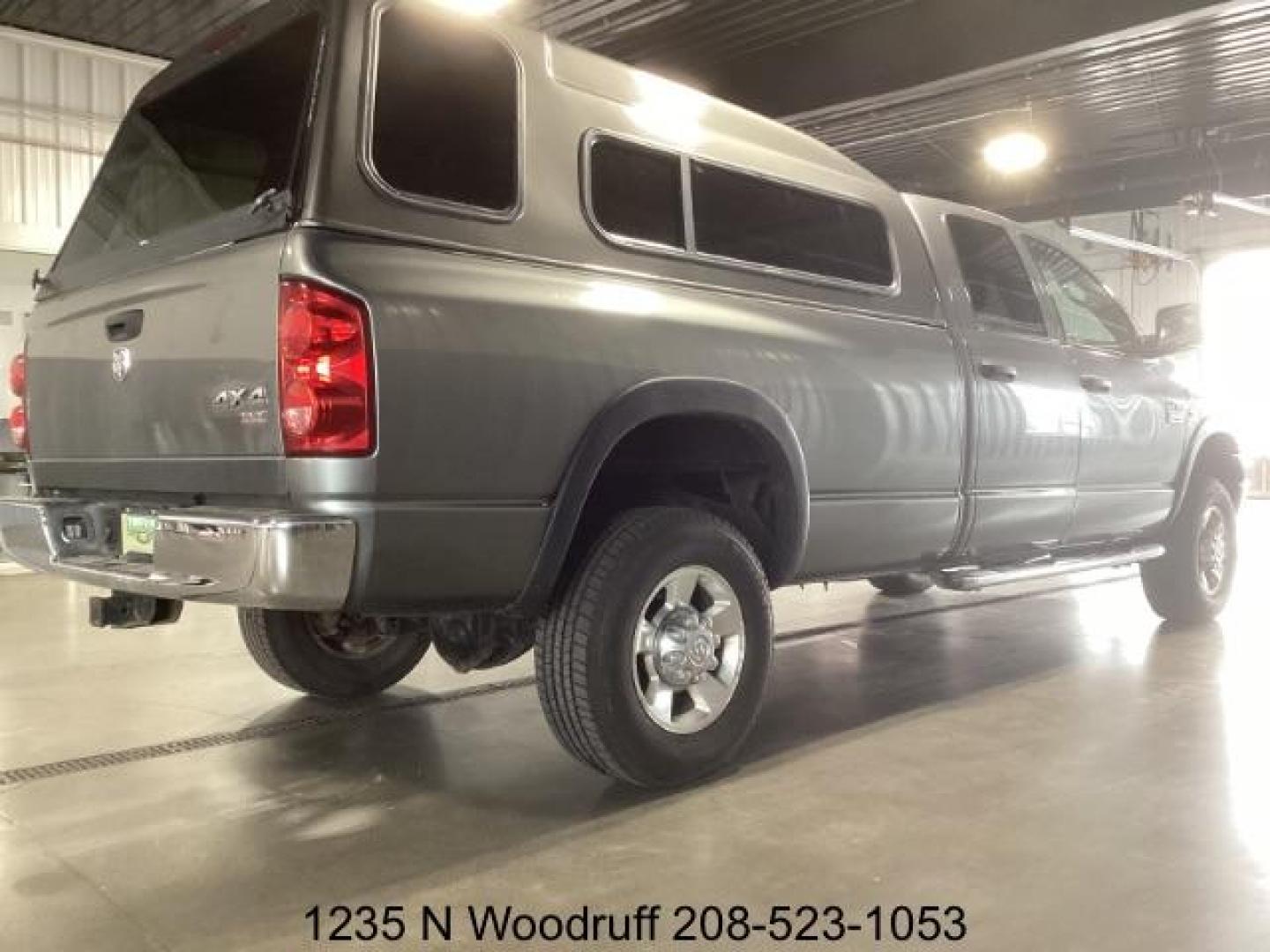 2007 GRAY /Medium Slate Gray Cloth Interior Dodge Ram 3500 SLT Quad Cab LWB 4WD DRW (3D7MX38C57G) with an 5.9L L6 OHV 24V TURBO DIESEL engine, 4-Speed Automatic transmission, located at 1235 N Woodruff Ave., Idaho Falls, 83401, (208) 523-1053, 43.507172, -112.000488 - At Timberline Auto, finding a great deal on your next vehicle is always easy! Our experienced sales staff's goal is to help find you the right vehicle at the right price! Our knowledgeable finance department has options for almost any credit score. We offer extended service contract options to prote - Photo#4