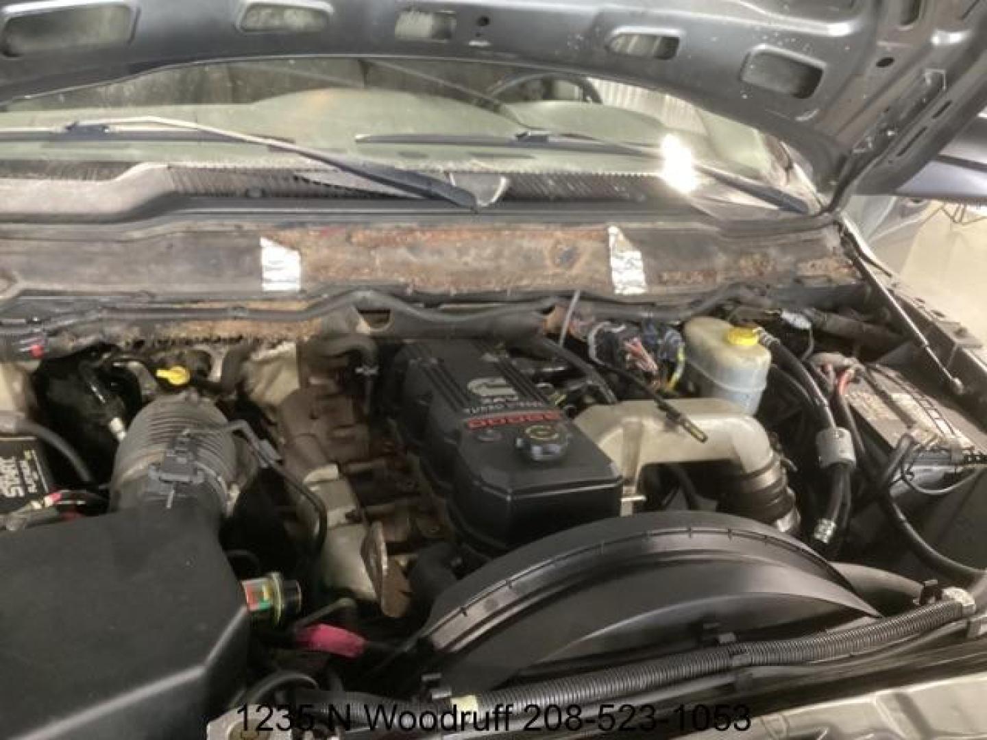 2007 GRAY /Medium Slate Gray Cloth Interior Dodge Ram 3500 SLT Quad Cab LWB 4WD DRW (3D7MX38C57G) with an 5.9L L6 OHV 24V TURBO DIESEL engine, 4-Speed Automatic transmission, located at 1235 N Woodruff Ave., Idaho Falls, 83401, (208) 523-1053, 43.507172, -112.000488 - At Timberline Auto, finding a great deal on your next vehicle is always easy! Our experienced sales staff's goal is to help find you the right vehicle at the right price! Our knowledgeable finance department has options for almost any credit score. We offer extended service contract options to prote - Photo#6