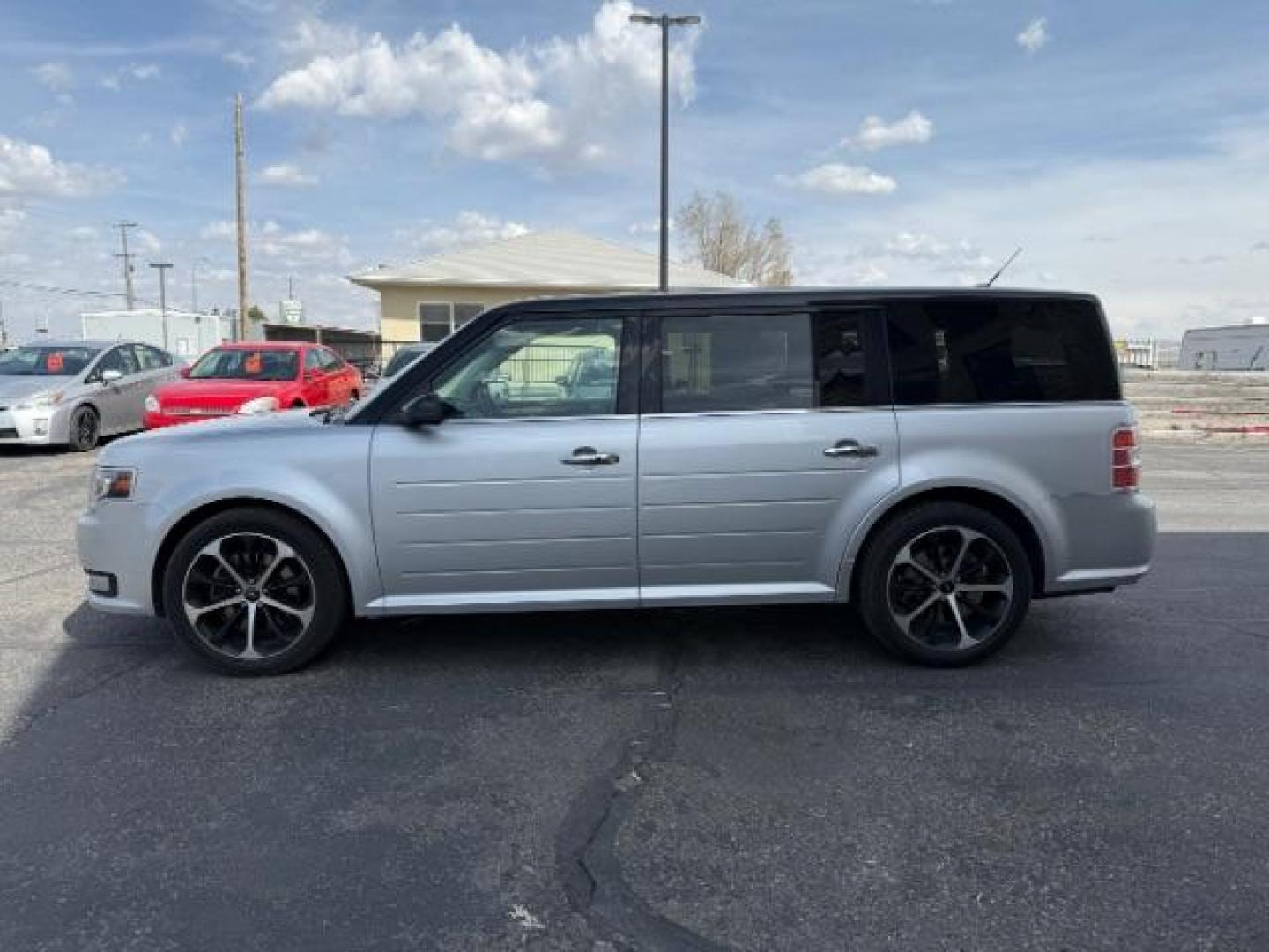 2013 Ingot Silver Metallic /Charcoal Black Leather Interior Ford Flex Limited AWD (2FMHK6DT9DB) with an 3.5L V6 DOHC 24V engine, 6-Speed Automatic Overdrive transmission, located at 1235 N Woodruff Ave., Idaho Falls, 83401, (208) 523-1053, 43.507172, -112.000488 - At Timberline Auto, finding a great deal on your next vehicle is always easy! Our experienced sales staff's goal is to help find you the right vehicle at the right price! Our knowledgeable finance department has options for almost any credit score. We offer extended service contract options to prote - Photo#1