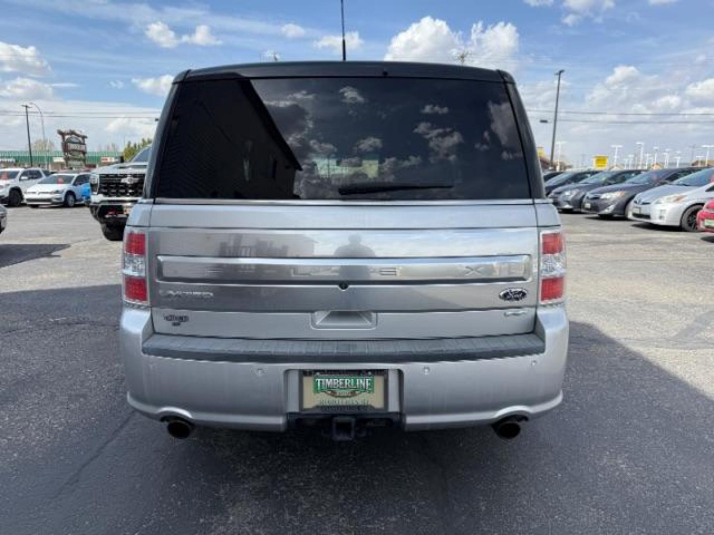 2013 Ingot Silver Metallic /Charcoal Black Leather Interior Ford Flex Limited AWD (2FMHK6DT9DB) with an 3.5L V6 DOHC 24V engine, 6-Speed Automatic Overdrive transmission, located at 1235 N Woodruff Ave., Idaho Falls, 83401, (208) 523-1053, 43.507172, -112.000488 - At Timberline Auto, finding a great deal on your next vehicle is always easy! Our experienced sales staff's goal is to help find you the right vehicle at the right price! Our knowledgeable finance department has options for almost any credit score. We offer extended service contract options to prote - Photo#3