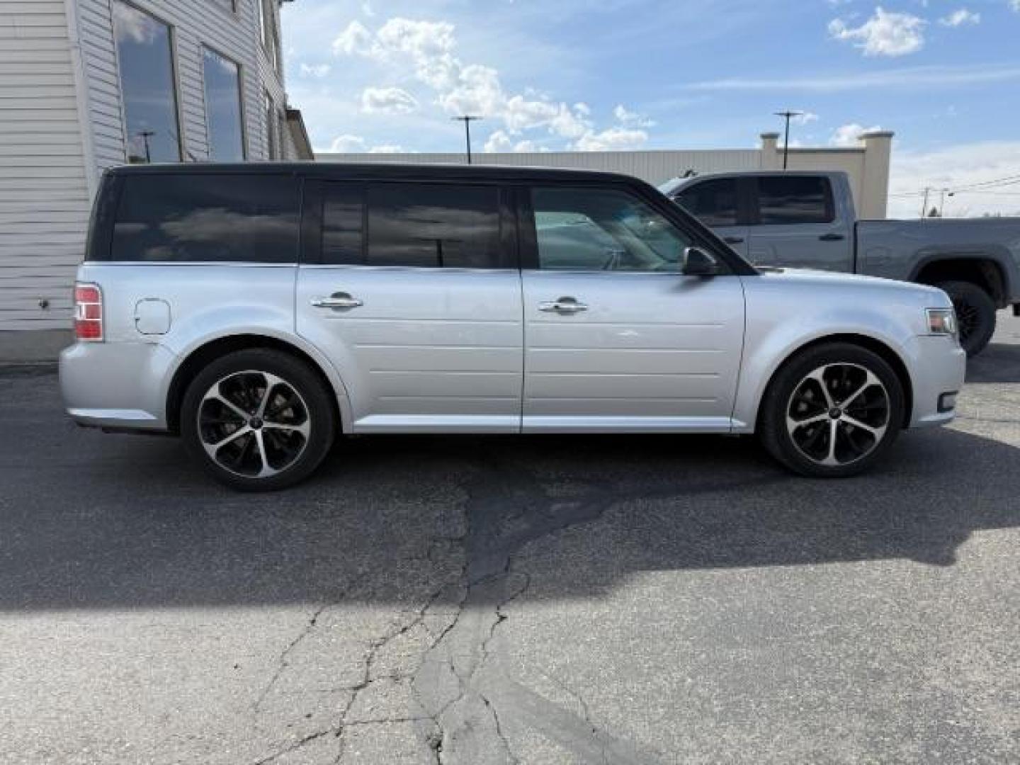 2013 Ingot Silver Metallic /Charcoal Black Leather Interior Ford Flex Limited AWD (2FMHK6DT9DB) with an 3.5L V6 DOHC 24V engine, 6-Speed Automatic Overdrive transmission, located at 1235 N Woodruff Ave., Idaho Falls, 83401, (208) 523-1053, 43.507172, -112.000488 - At Timberline Auto, finding a great deal on your next vehicle is always easy! Our experienced sales staff's goal is to help find you the right vehicle at the right price! Our knowledgeable finance department has options for almost any credit score. We offer extended service contract options to prote - Photo#5