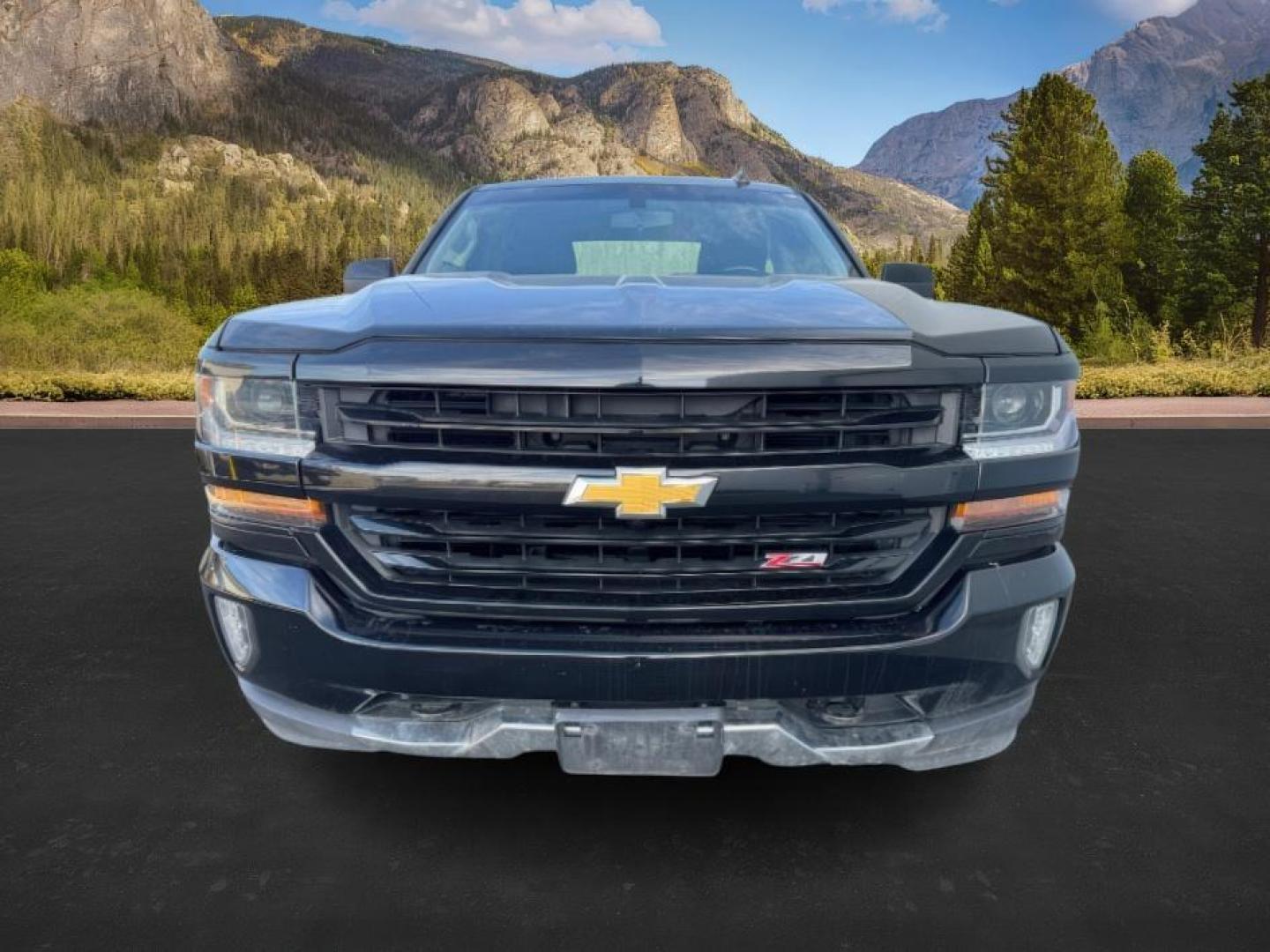 2018 Black /Jet Black, cloth Chevrolet Silverado 1500 LT Crew Cab 4WD (1GCUKREC0JF) with an 5.3L V8 OHV 16V engine, 6-Speed Automatic transmission, located at 1235 N Woodruff Ave., Idaho Falls, 83401, (208) 523-1053, 43.507172, -112.000488 - At Timberline Auto, finding a great deal on your next vehicle is always easy! Our experienced sales staff's goal is to help find you the right vehicle at the right price! Our knowledgeable finance department has options for almost any credit score. We offer extended service contract options to prote - Photo#5