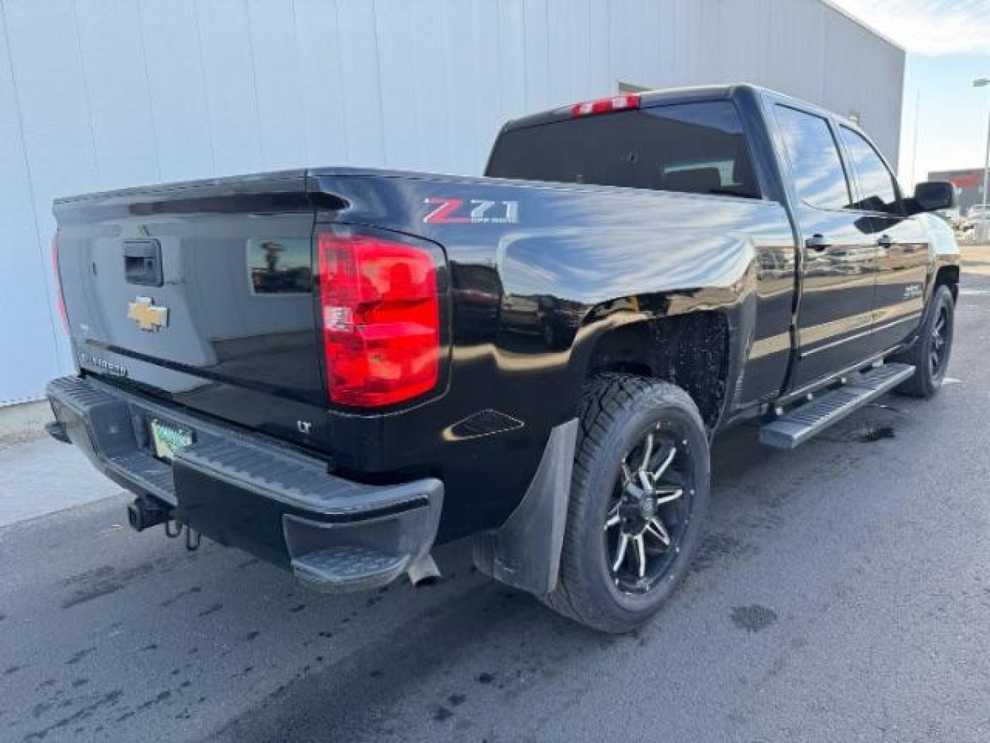 2018 Black /Jet Black, cloth Chevrolet Silverado 1500 LT Crew Cab 4WD (1GCUKREC0JF) with an 5.3L V8 OHV 16V engine, 6-Speed Automatic transmission, located at 1235 N Woodruff Ave., Idaho Falls, 83401, (208) 523-1053, 43.507172, -112.000488 - At Timberline Auto, finding a great deal on your next vehicle is always easy! Our experienced sales staff's goal is to help find you the right vehicle at the right price! Our knowledgeable finance department has options for almost any credit score. We offer extended service contract options to prote - Photo#3