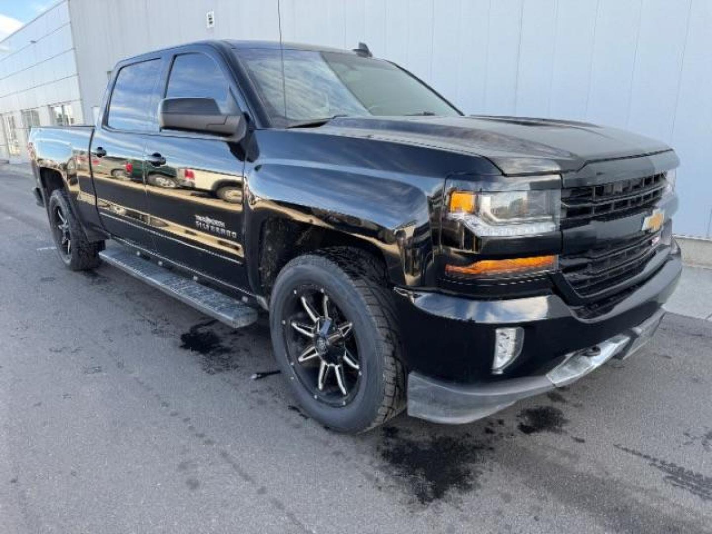 2018 Black /Jet Black, cloth Chevrolet Silverado 1500 LT Crew Cab 4WD (1GCUKREC0JF) with an 5.3L V8 OHV 16V engine, 6-Speed Automatic transmission, located at 1235 N Woodruff Ave., Idaho Falls, 83401, (208) 523-1053, 43.507172, -112.000488 - At Timberline Auto, finding a great deal on your next vehicle is always easy! Our experienced sales staff's goal is to help find you the right vehicle at the right price! Our knowledgeable finance department has options for almost any credit score. We offer extended service contract options to prote - Photo#4