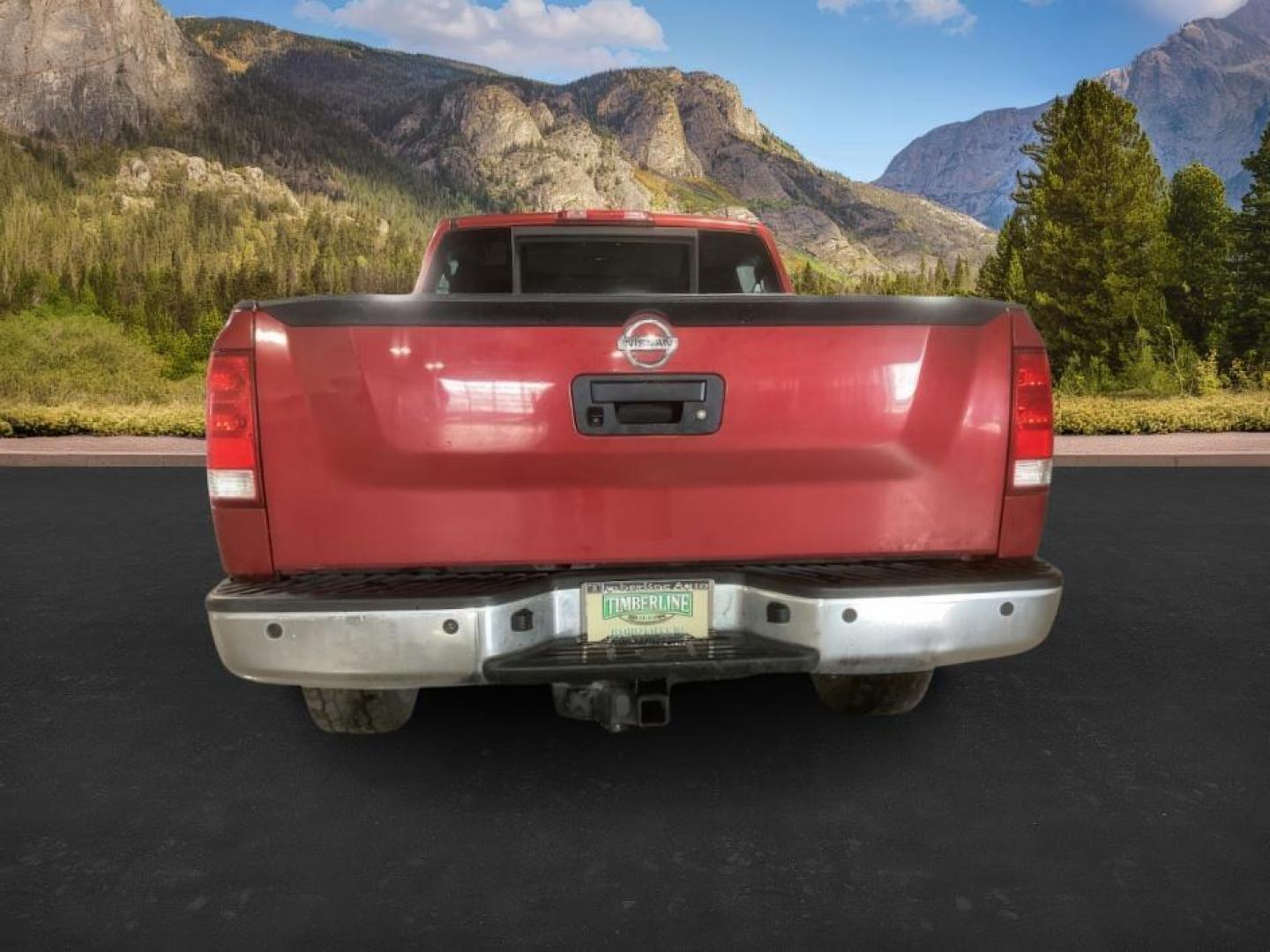2014 Cayenne Red Metallic /Charcoal Nissan Titan SL Crew Cab 4WD (1N6AA0EC1EN) with an 5.6L V8 DOHC 32V engine, 5-Speed Automatic transmission, located at 1235 N Woodruff Ave., Idaho Falls, 83401, (208) 523-1053, 43.507172, -112.000488 - At Timberline Auto, finding a great deal on your next vehicle is always easy! Our experienced sales staff's goal is to help find you the right vehicle at the right price! Our knowledgeable finance department has options for almost any credit score. We offer extended service contract options to prote - Photo#3