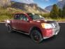 2014 Cayenne Red Metallic /Charcoal Nissan Titan SL Crew Cab 4WD (1N6AA0EC1EN) with an 5.6L V8 DOHC 32V engine, 5-Speed Automatic transmission, located at 1235 N Woodruff Ave., Idaho Falls, 83401, (208) 523-1053, 43.507172, -112.000488 - At Timberline Auto, finding a great deal on your next vehicle is always easy! Our experienced sales staff's goal is to help find you the right vehicle at the right price! Our knowledgeable finance department has options for almost any credit score. We offer extended service contract options to prote - Photo#5