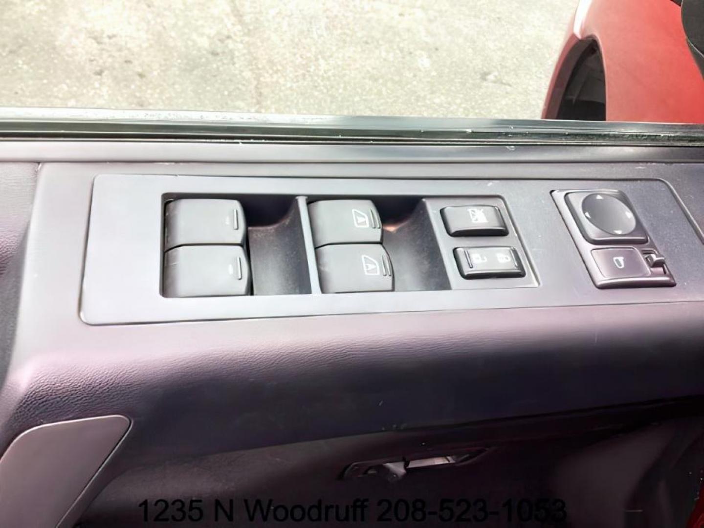 2014 Cayenne Red Metallic /Charcoal Nissan Titan SL Crew Cab 4WD (1N6AA0EC1EN) with an 5.6L V8 DOHC 32V engine, 5-Speed Automatic transmission, located at 1235 N Woodruff Ave., Idaho Falls, 83401, (208) 523-1053, 43.507172, -112.000488 - At Timberline Auto, finding a great deal on your next vehicle is always easy! Our experienced sales staff's goal is to help find you the right vehicle at the right price! Our knowledgeable finance department has options for almost any credit score. We offer extended service contract options to prote - Photo#11