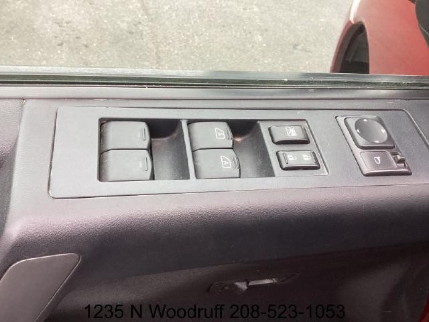 2014 Cayenne Red Metallic /Charcoal Nissan Titan SL Crew Cab 4WD (1N6AA0EC1EN) with an 5.6L V8 DOHC 32V engine, 5-Speed Automatic transmission, located at 1235 N Woodruff Ave., Idaho Falls, 83401, (208) 523-1053, 43.507172, -112.000488 - At Timberline Auto, finding a great deal on your next vehicle is always easy! Our experienced sales staff's goal is to help find you the right vehicle at the right price! Our knowledgeable finance department has options for almost any credit score. We offer extended service contract options to prote - Photo#11